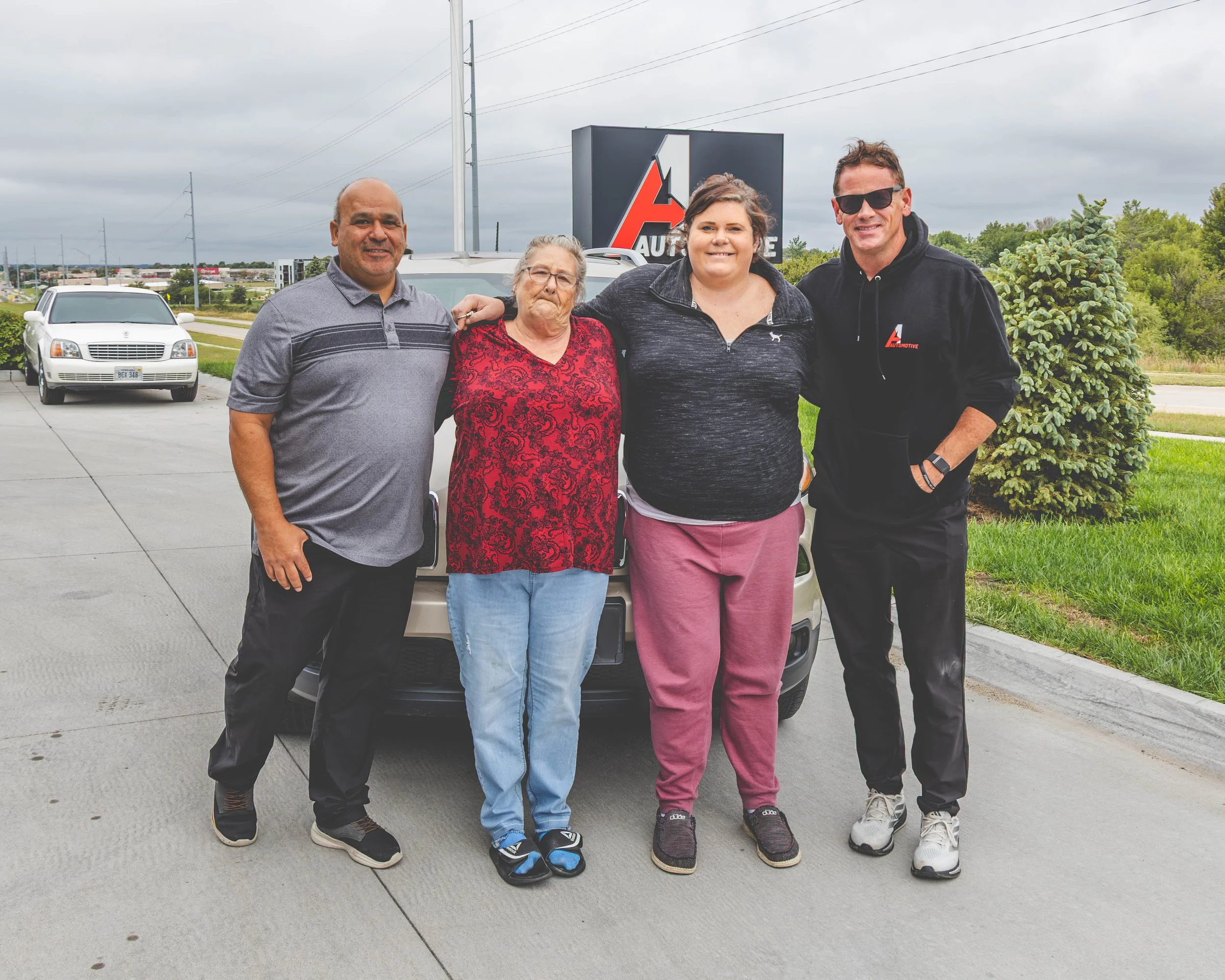 Kendall Warnock of A1 Automotive after giving a refurbished, donated vehicle to a member of the Lincoln community