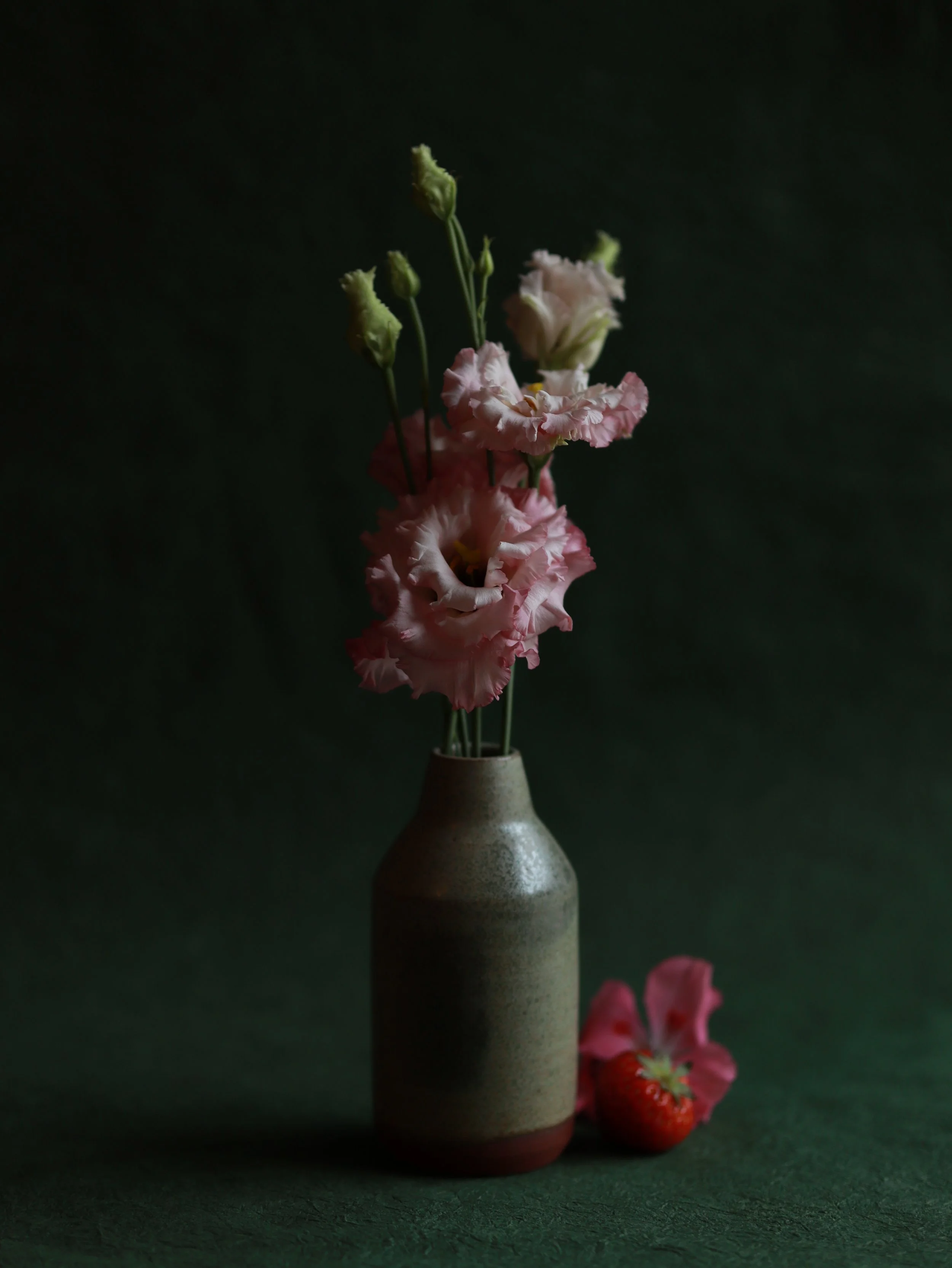 Françoise I, lisianthus with red clay vase by Françoise De Smet