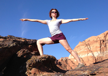  Joy in a yoga pose on rocks 