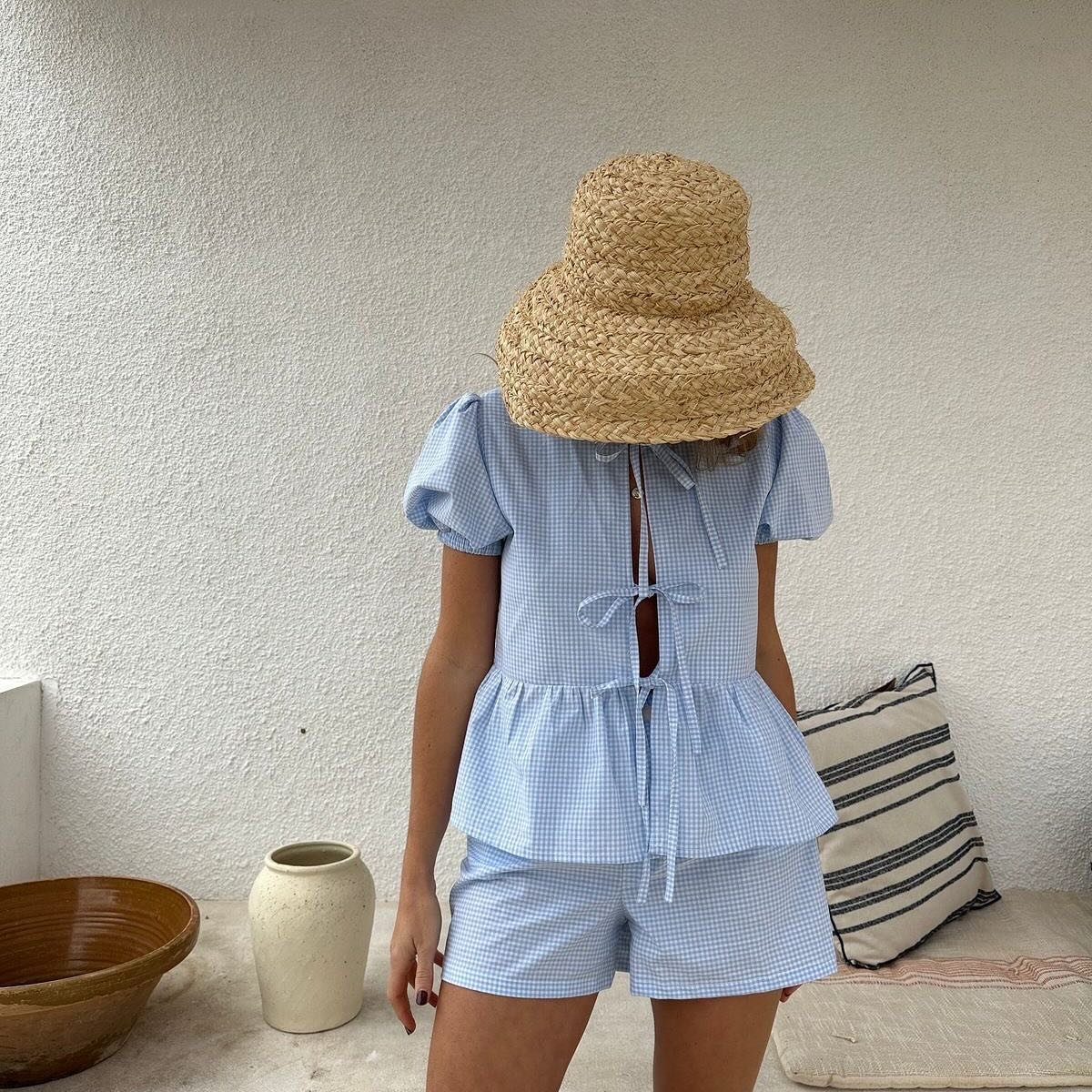 There are two summer trends we spot in this photo. Can you find them? 🤔☀️🌻

#summer #summervibes #summertime #summertrends #fashionstyle #fashionblogger #strawhat #ginghamdress #ginghamtop #ootd #instagram #instagood #summerinspiration #outfitinspo