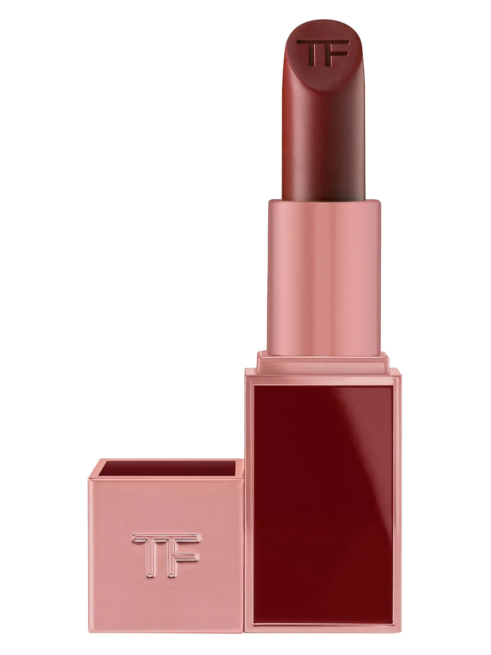 A lipstick with a rose pink casing and the initials 'TF' engraved on the cap, showing a muted red-brown shade.
