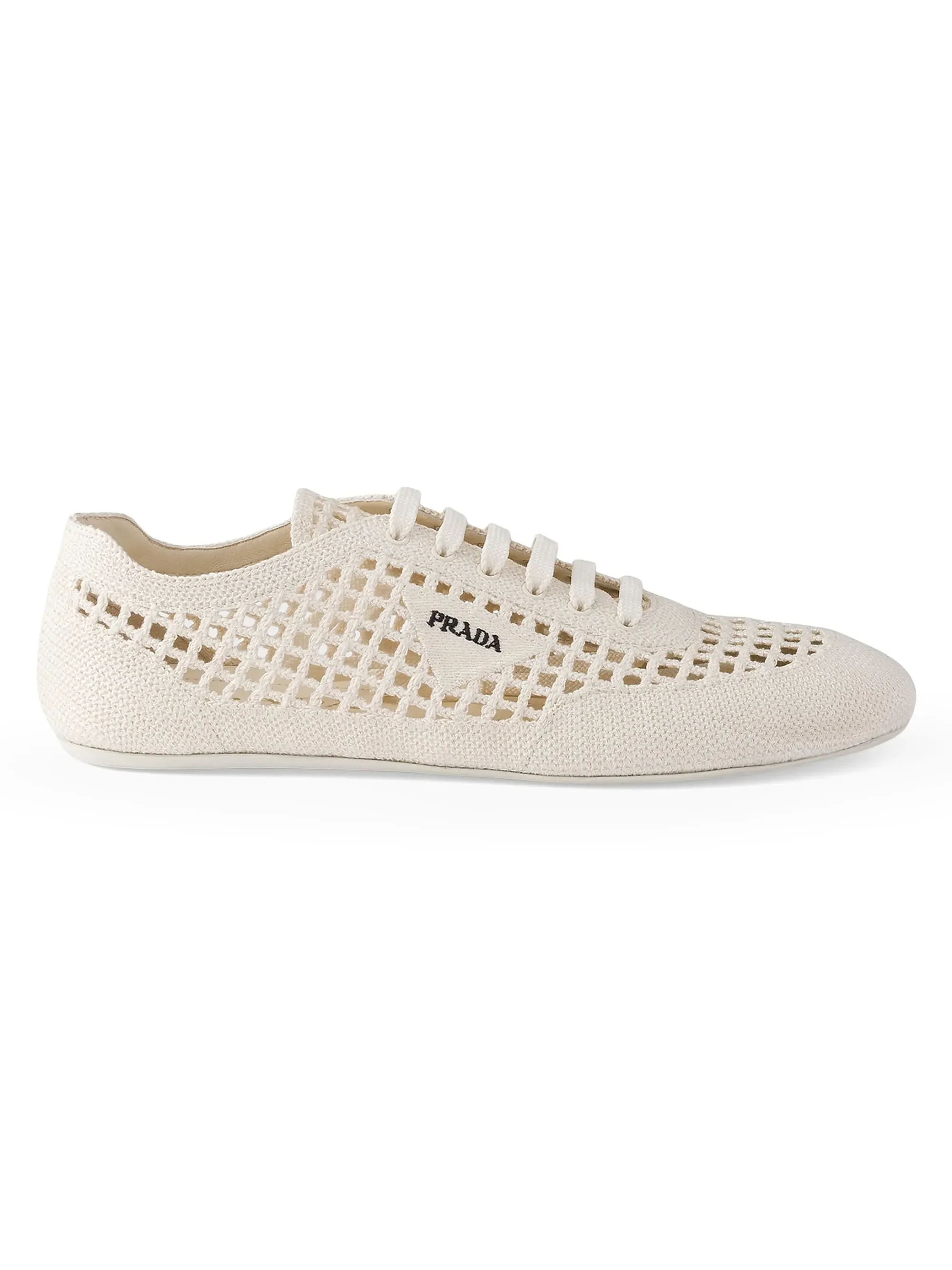 Cream-colored Prada mesh sneaker with lace-up design and black Prada logo on side.