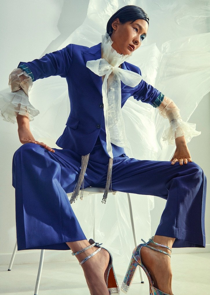 Women’s Blue Two-Button Wool Blazer and Women’s Blue Wool Trousers by Paul Smith, White high collar neck shirt by JU-NNA under, Sheer Beige Diamond Shirt By Alabama Blonde, Cassandrinetta Alta shoes by Christian Louboutin. .jpeg