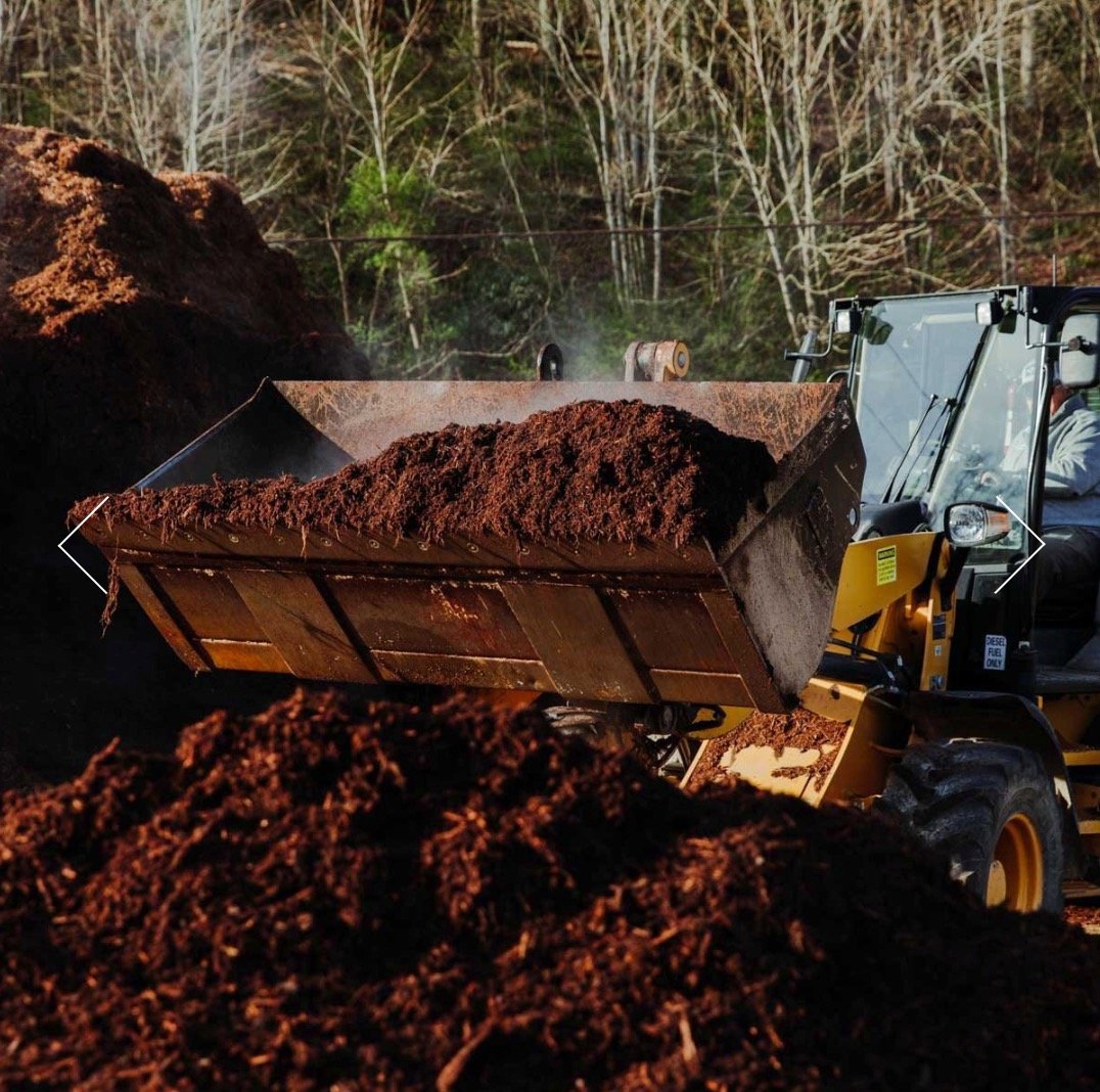 Tractor full of Double Grounded Hardwood Mulch