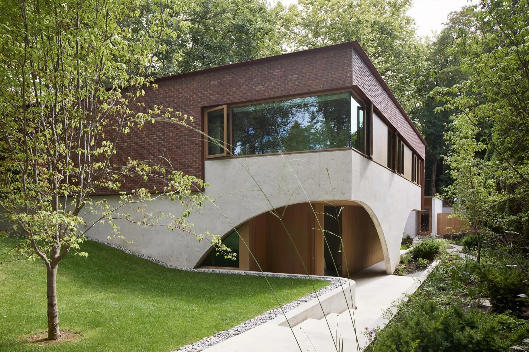 New single-family residence, uniquely designed with a partially daylighted basement that maximizes natural light on the lower level.

The approximately 4,300 sq. ft. of suspended concrete structure provides robust floor spans and exceptional durabili