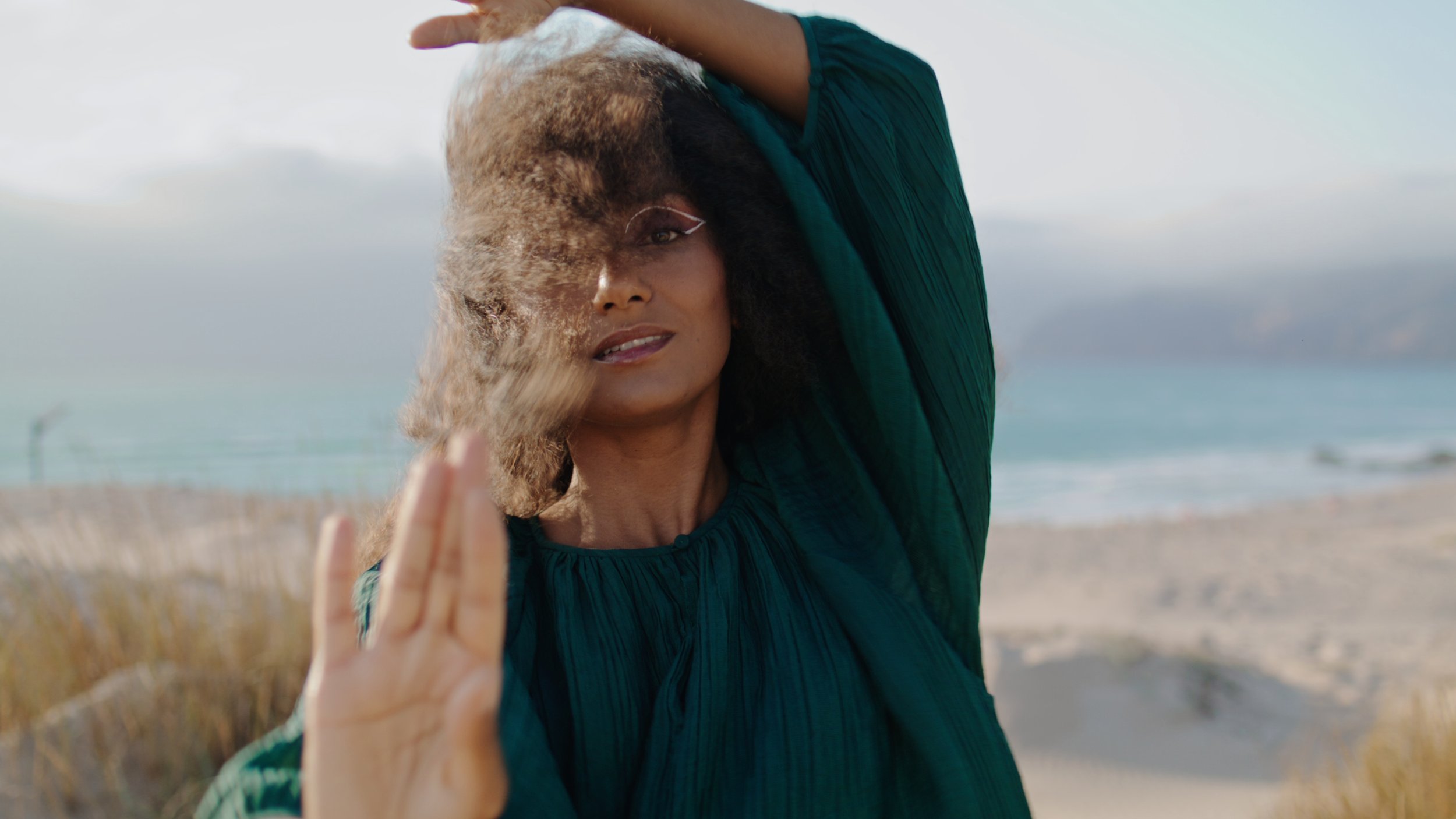 plastic-pretty-woman-dancing-improvisation-in-desert-with-dry-grass-on-backdrop-talent-SBI-350110863.jpg