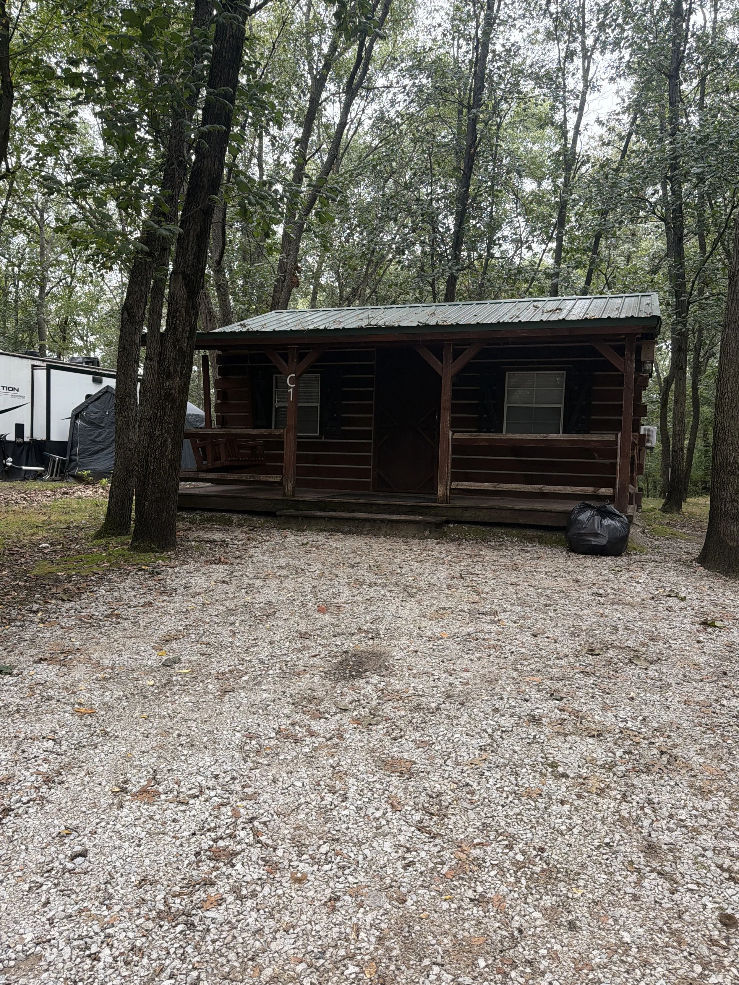 A cabin surrounded by trees