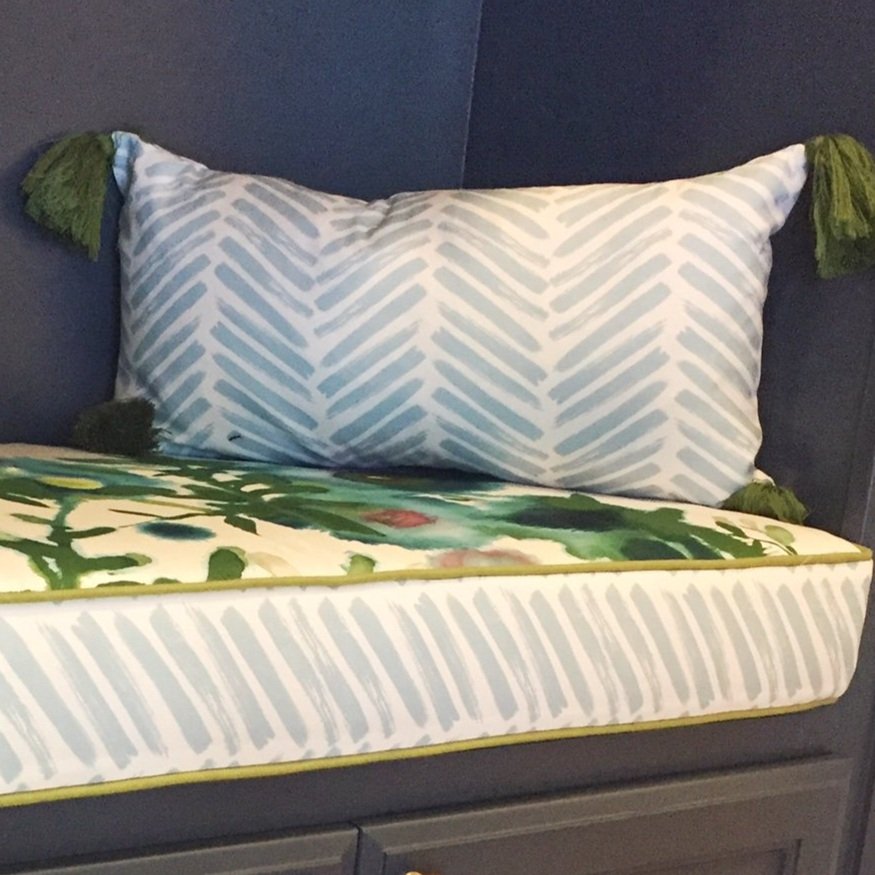Tassels on corners of pillow