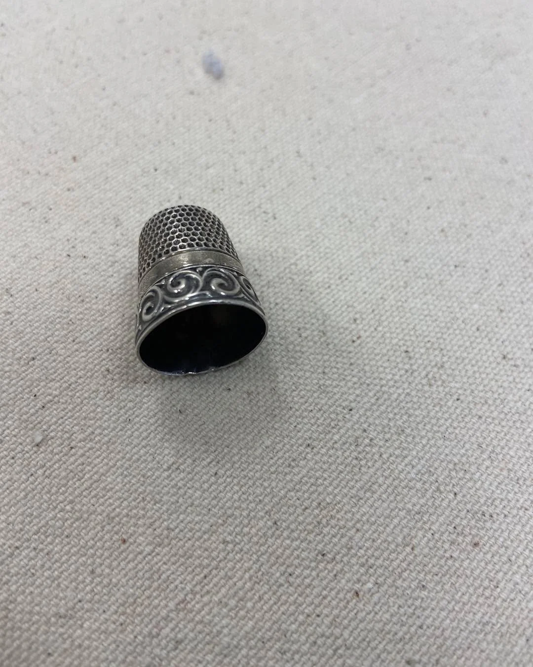 This is a thimble from my husband&rsquo;s grandmother.  I can&rsquo;t really use this one because it has a crack on top, but it is so beautiful to look at.  And how could anyone not wonder about its history and the projects made with it. I recently l