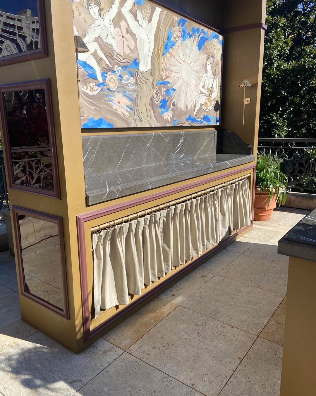 This is one of the may photos I took at the Kips Bay Decorator Showhouse in Dallas. I like how they used a little inside mount curtain to cover the storage area on this built-in. This was an example on their outdoor patio.

 I can&rsquo;t wait to see