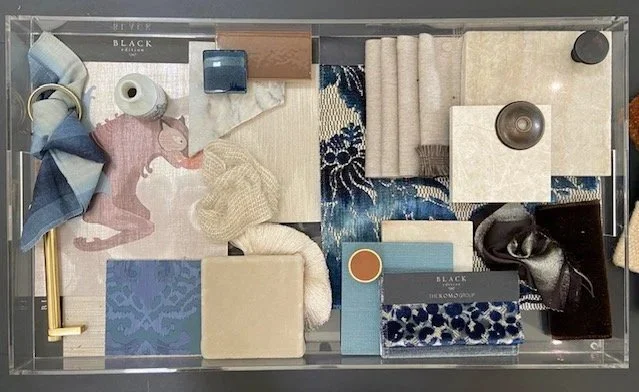 tray with different swatches of fabrics, trims, and hard surfaces