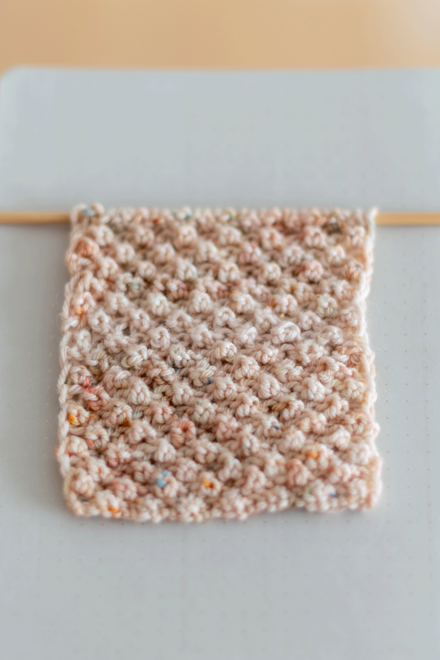 Close up of basic knitting stitches for beginners, knit and purl stitch on needles