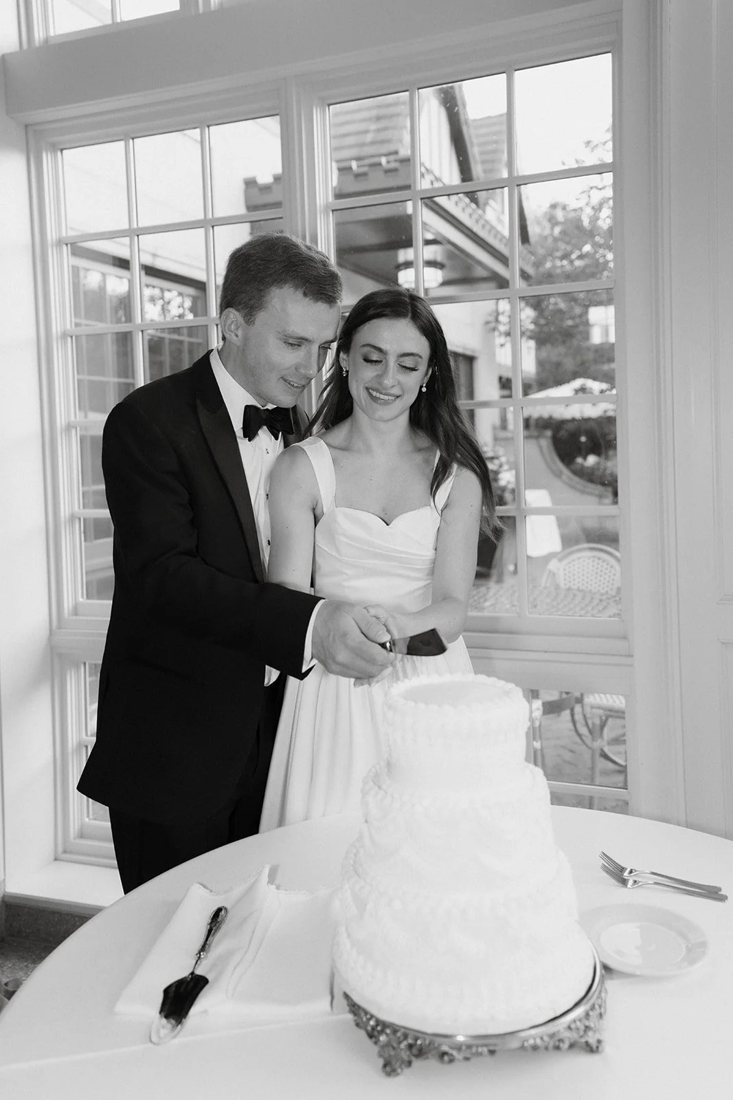 paine-art-center-wedding-cake-cutting.jpg
