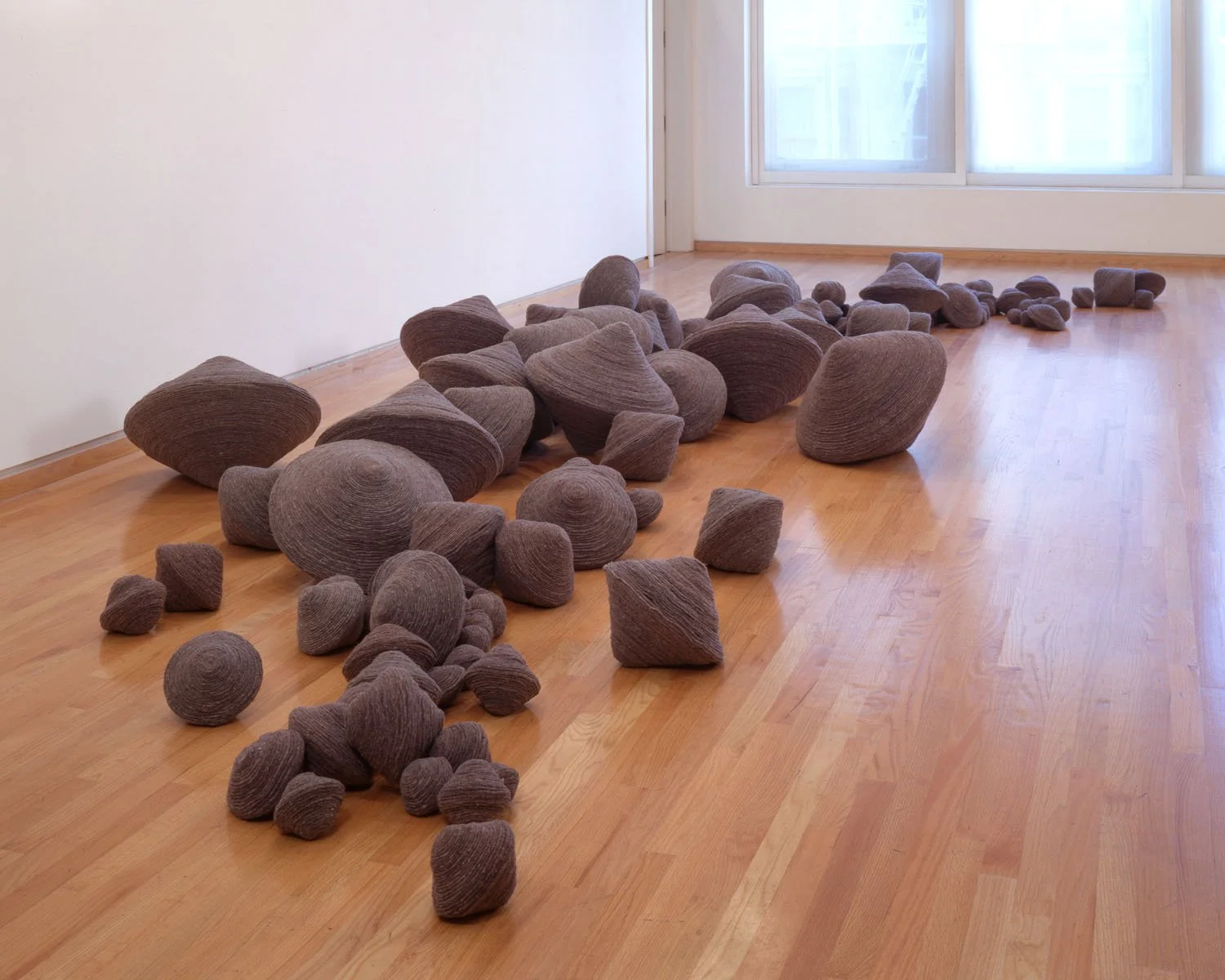 "Inertia", 2000, Felt blankets, glue, thread, 18 x 216 x 96 inches