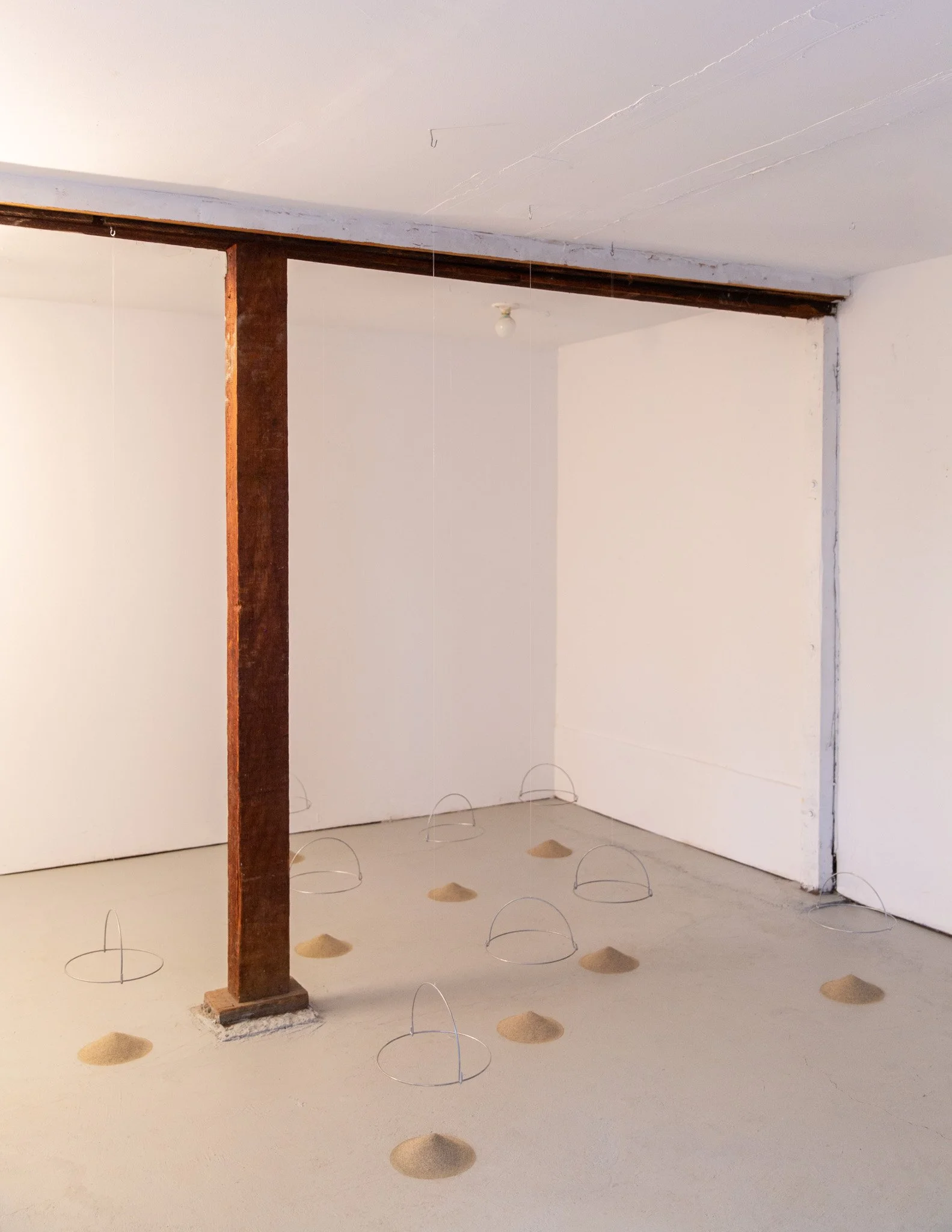 "Limbo", 2020, Sand, steel, nylon filament