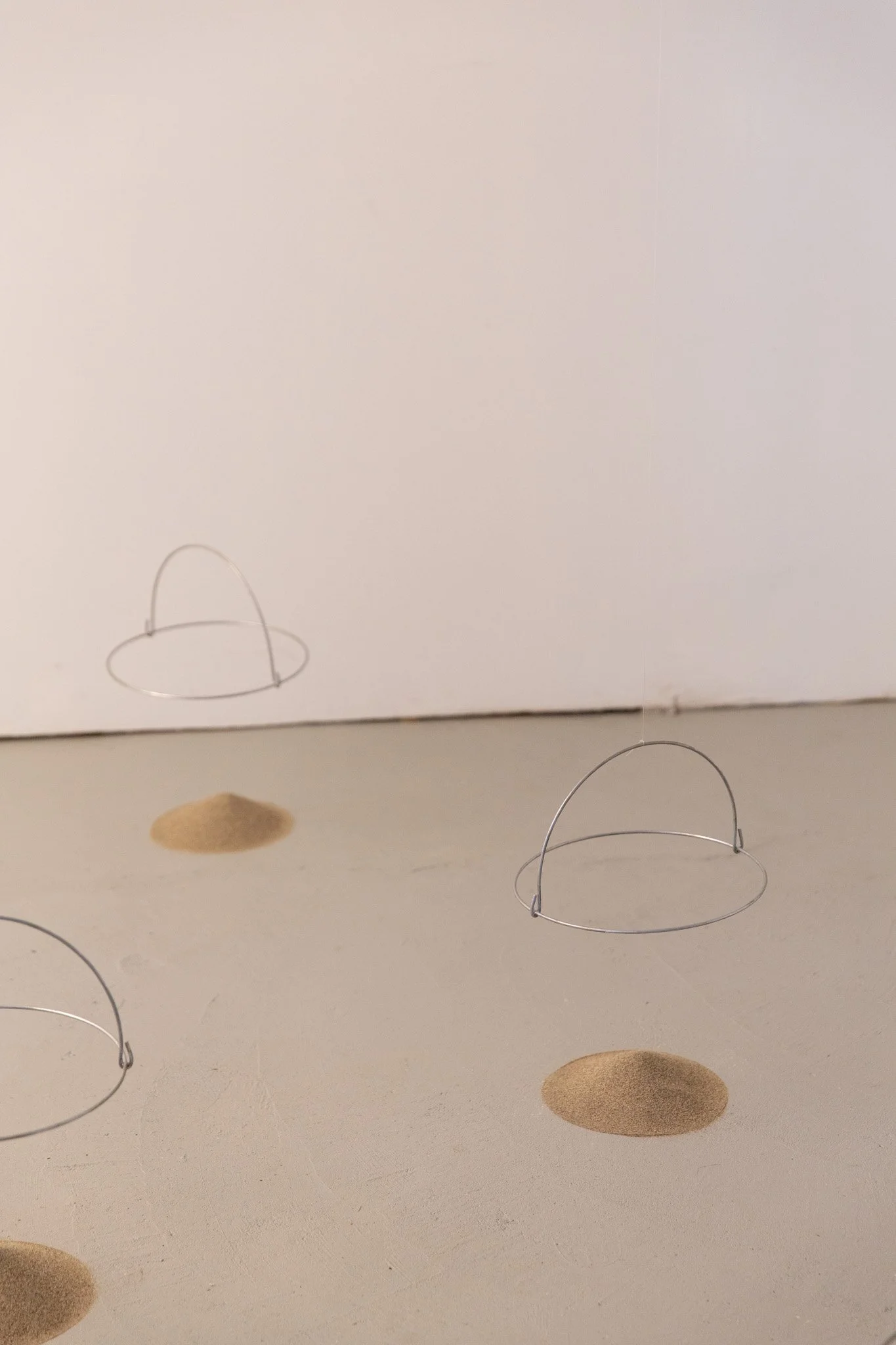 "Limbo", 2020, Sand, steel, nylon filament