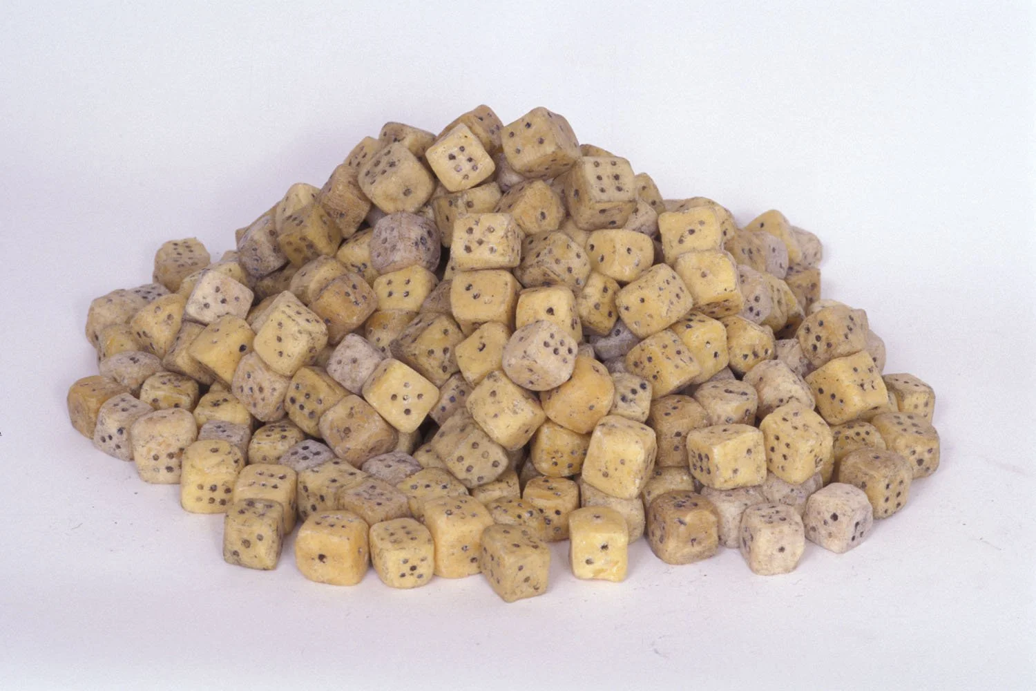"Fortune", 1999, Bees wax, graphite powder, Roughly 1 x 1 x 1 each cube