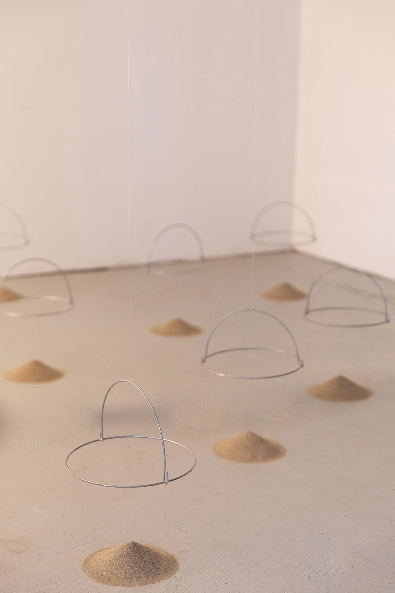 "Limbo", 2020, Sand, steel, nylon filament