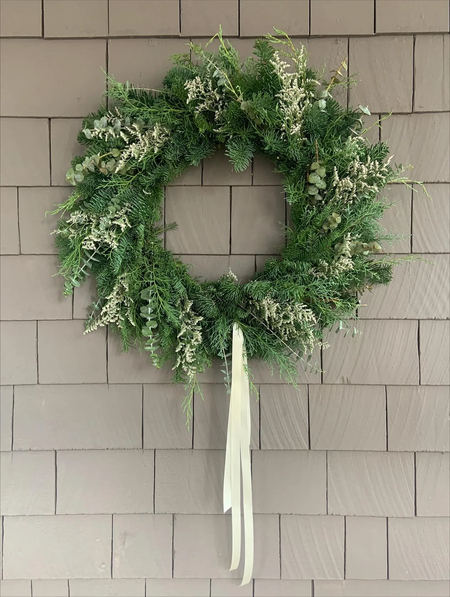 Handmade wreaths are made to order using natural evergreens and florals. Click the link in our bio for details and pricing. Delivery available within Calgary 🎀