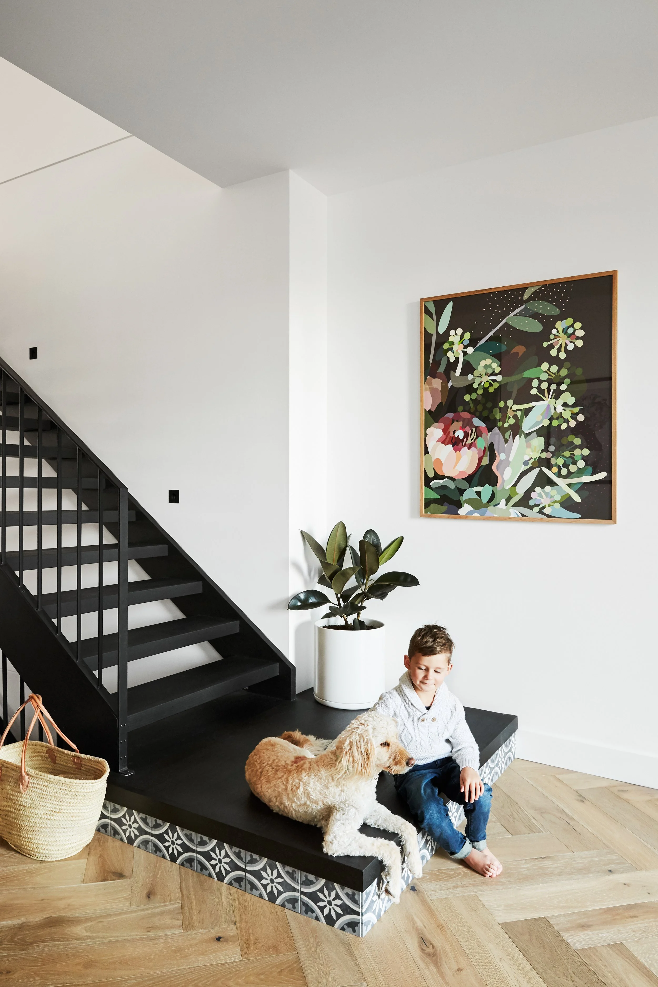 Staircase with child and dog, interiors photography