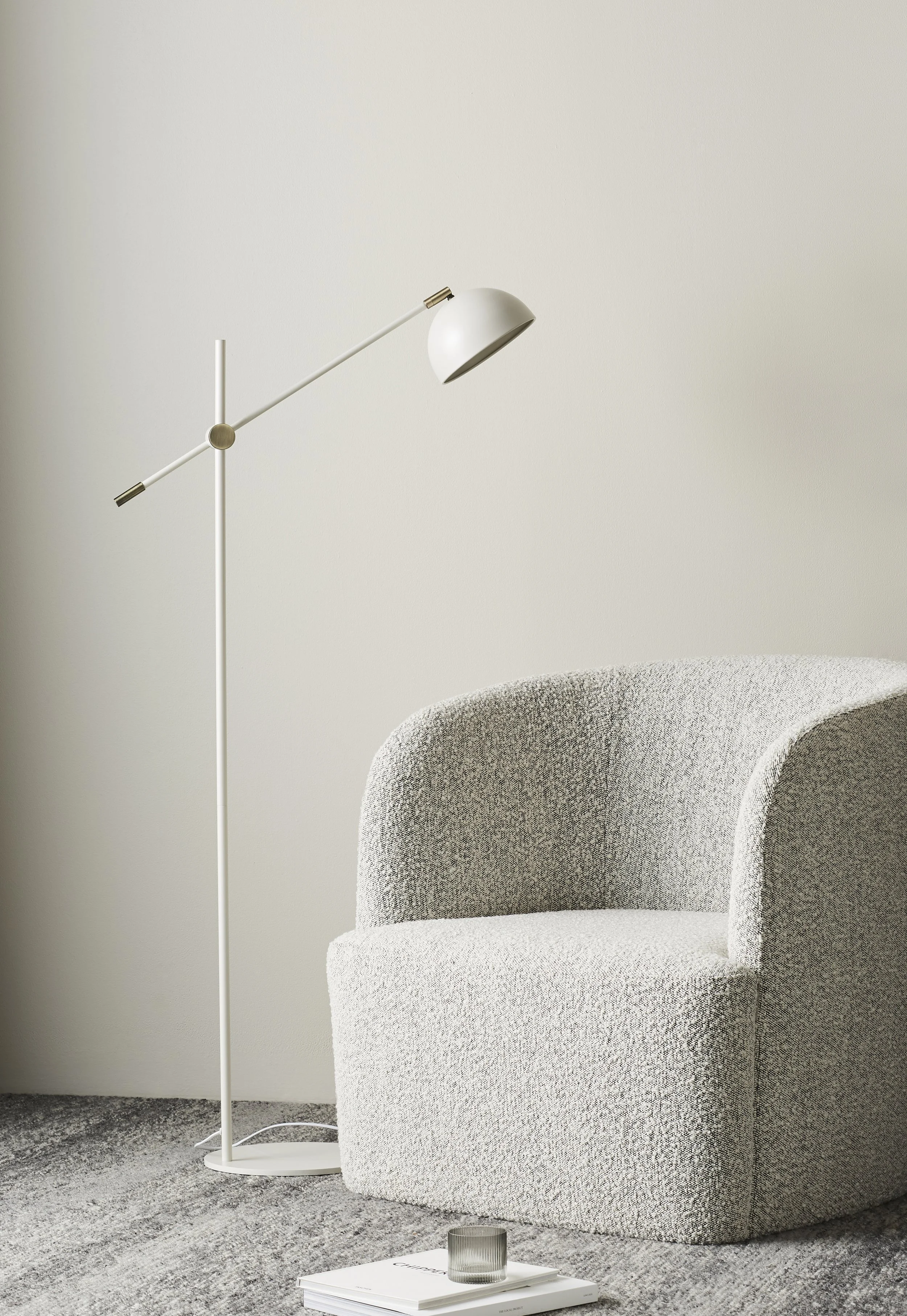 Designer chair with lamp, minimalist styling for homewares brand