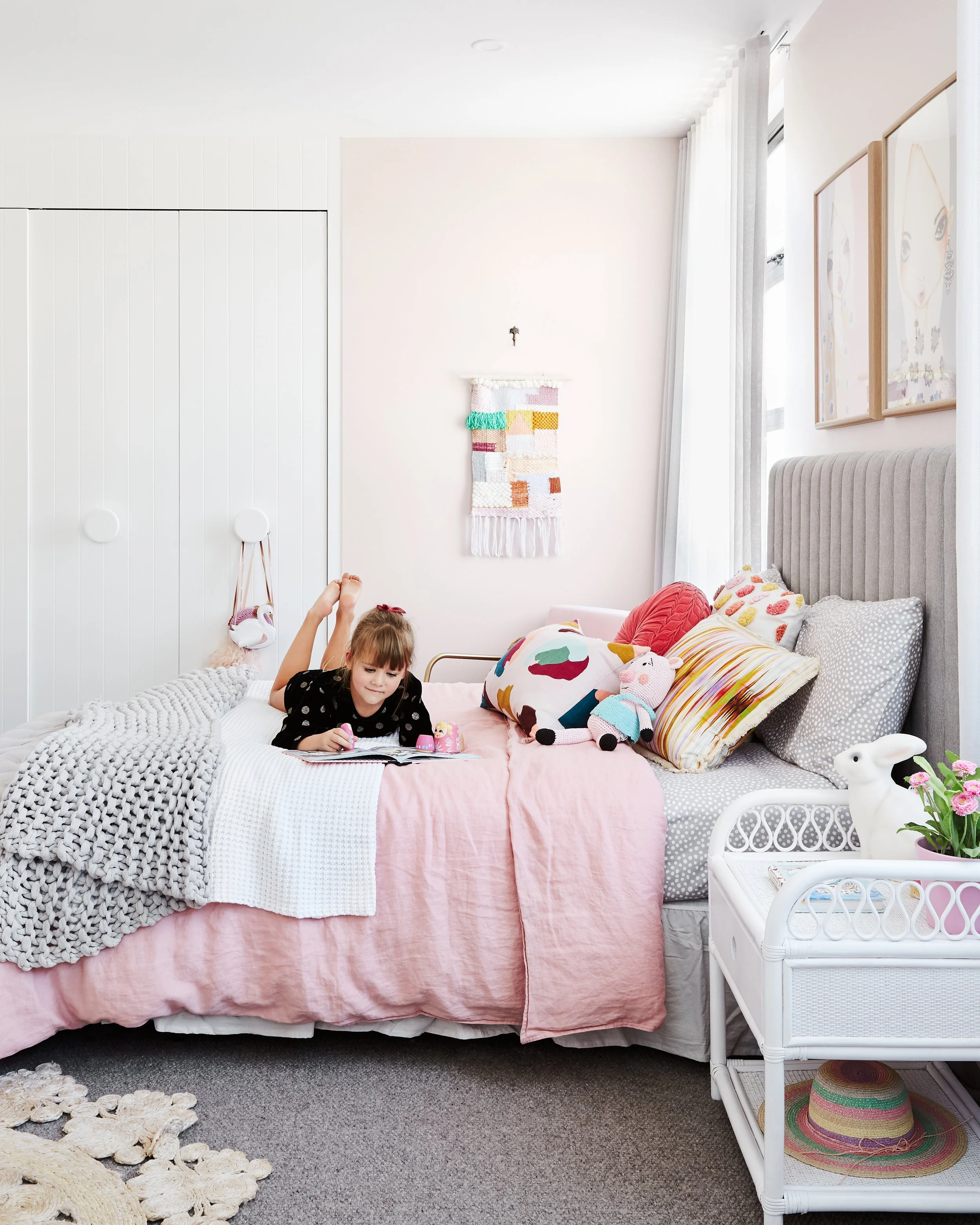 Girl in bedroom reading