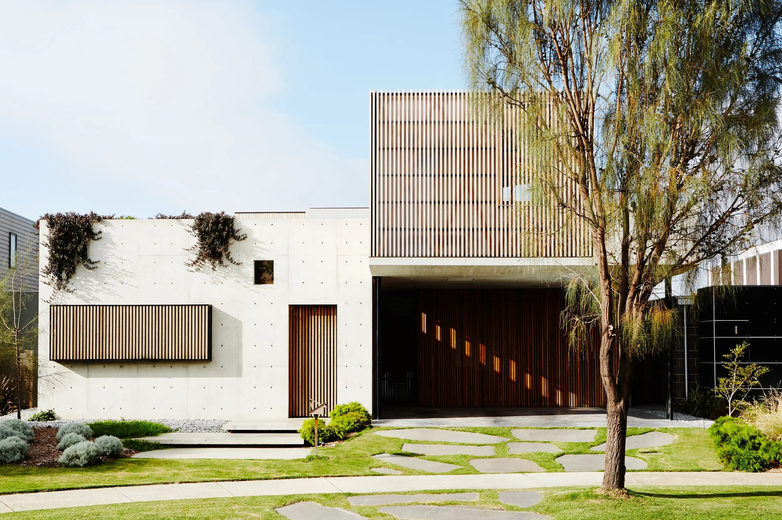 Architectural photography Melbourne, concrete and timber home exterior Auhaus architects