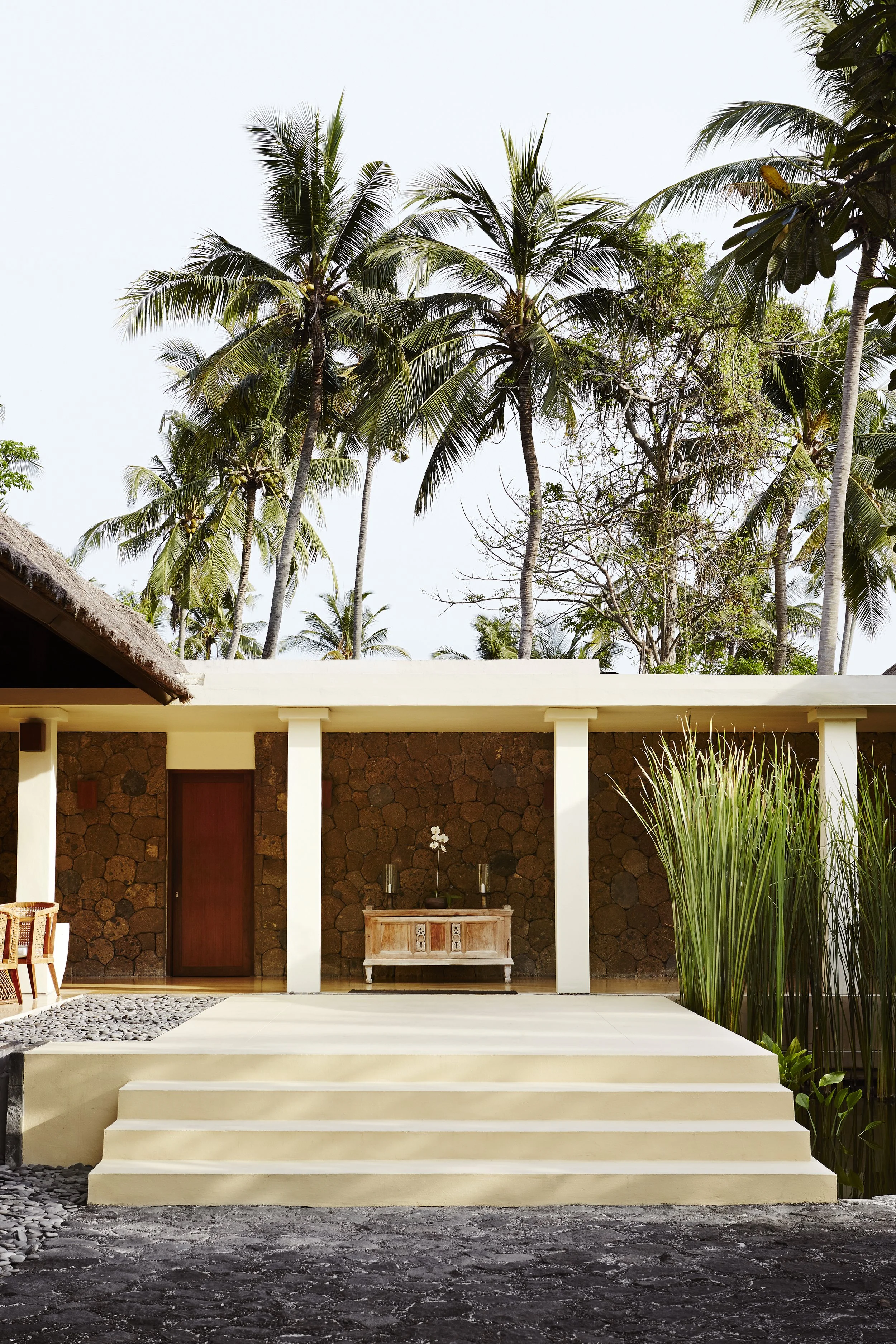 Hotel exterior with palm trees in Bali
