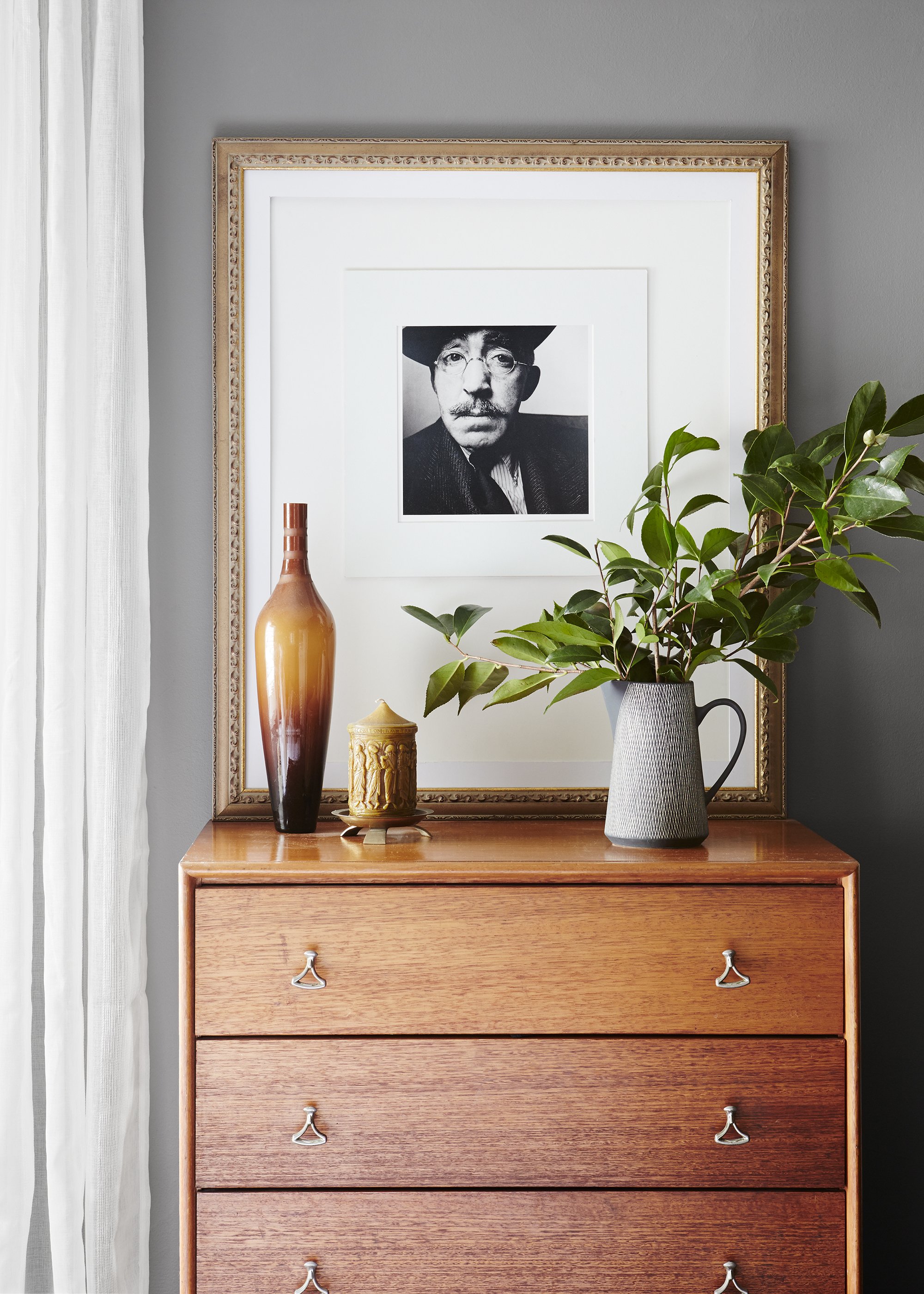 Timber cabinet detail with foliage