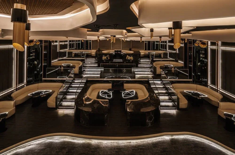 KOR Taipei – main lounge with tiered seating and illuminated tables – hospitality interior – Taipei, Taiwan