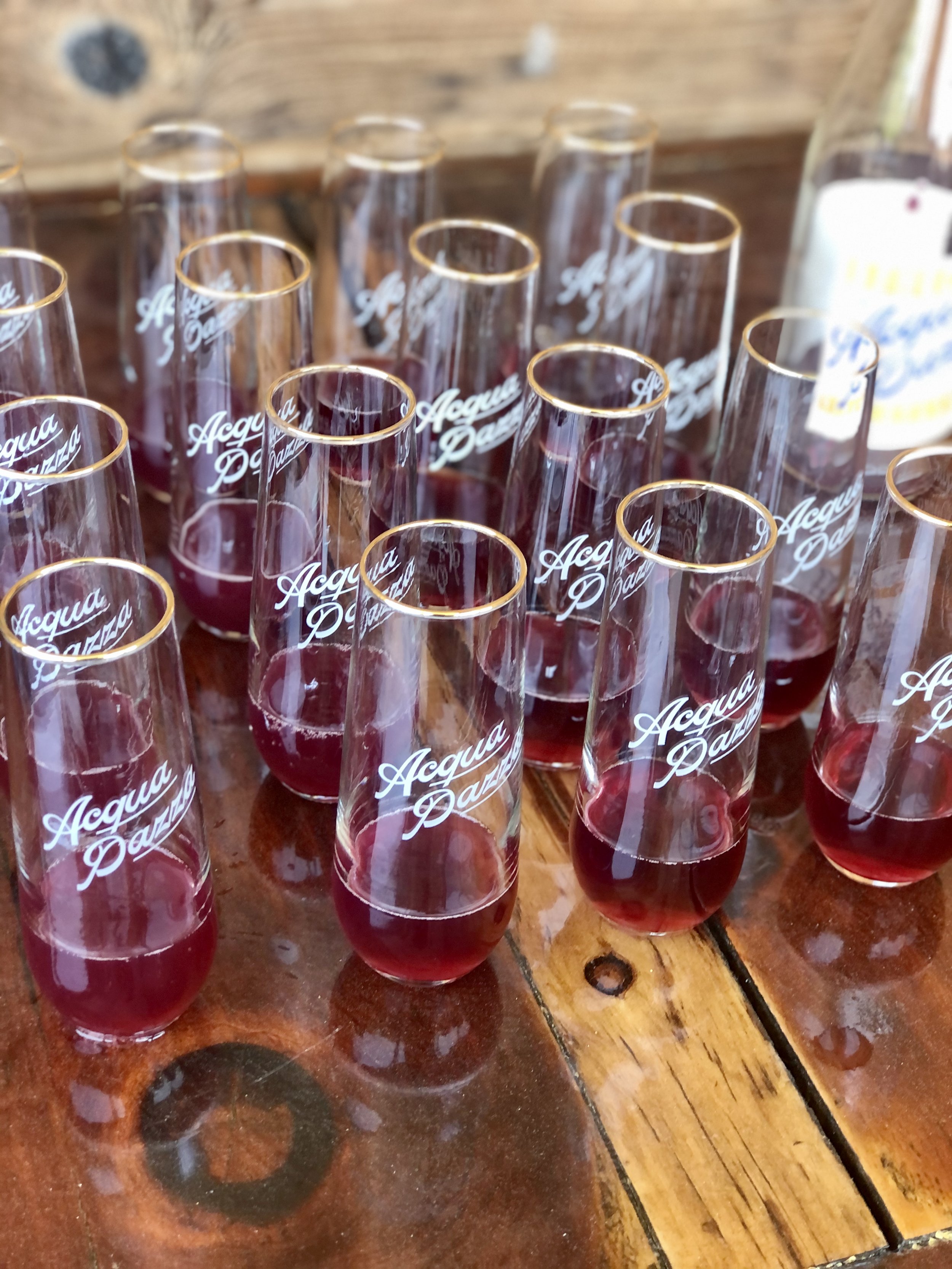 Labeled glasses filled with Acqua Pazza