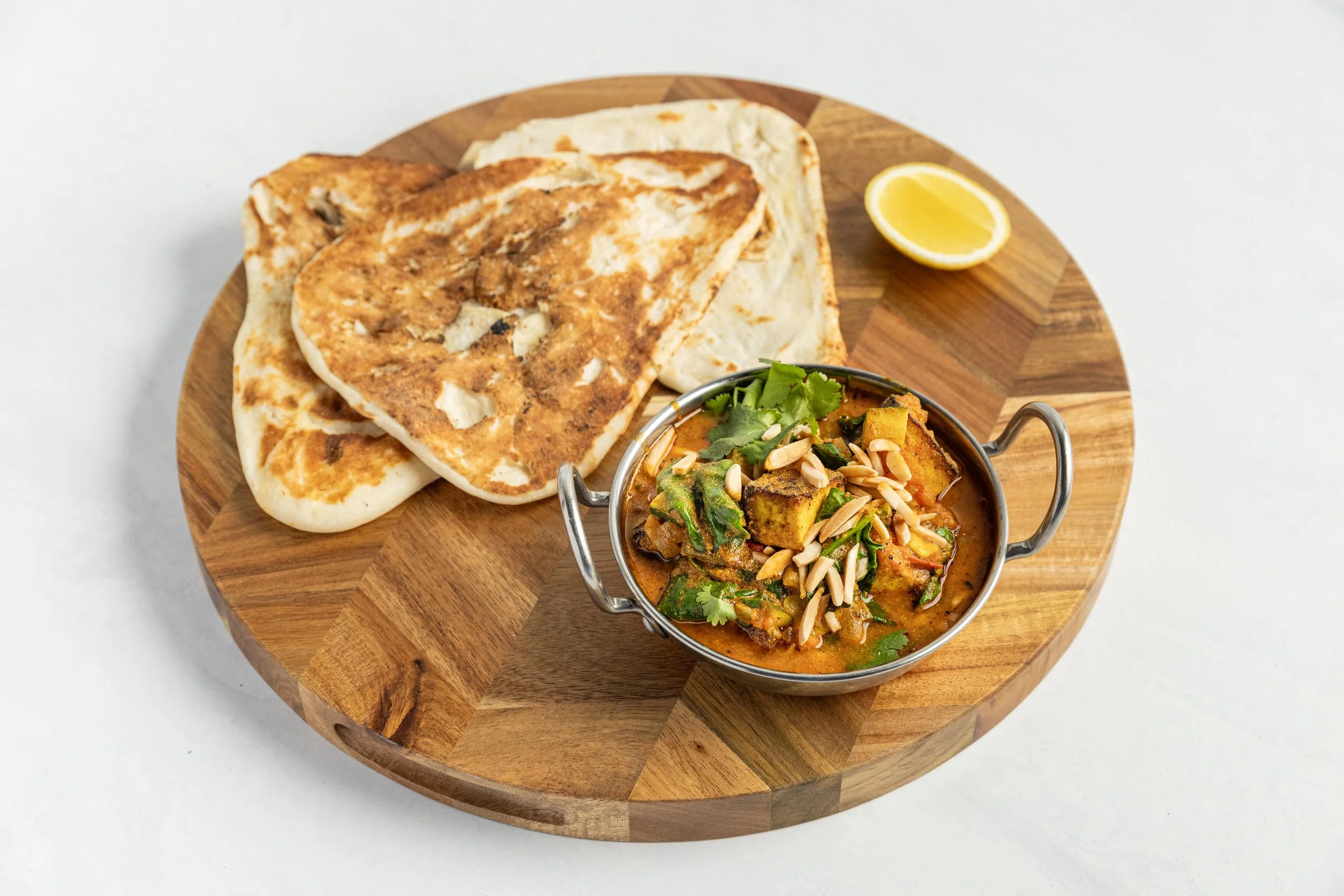 Tomato-Spiced Paneer Curry with Naan