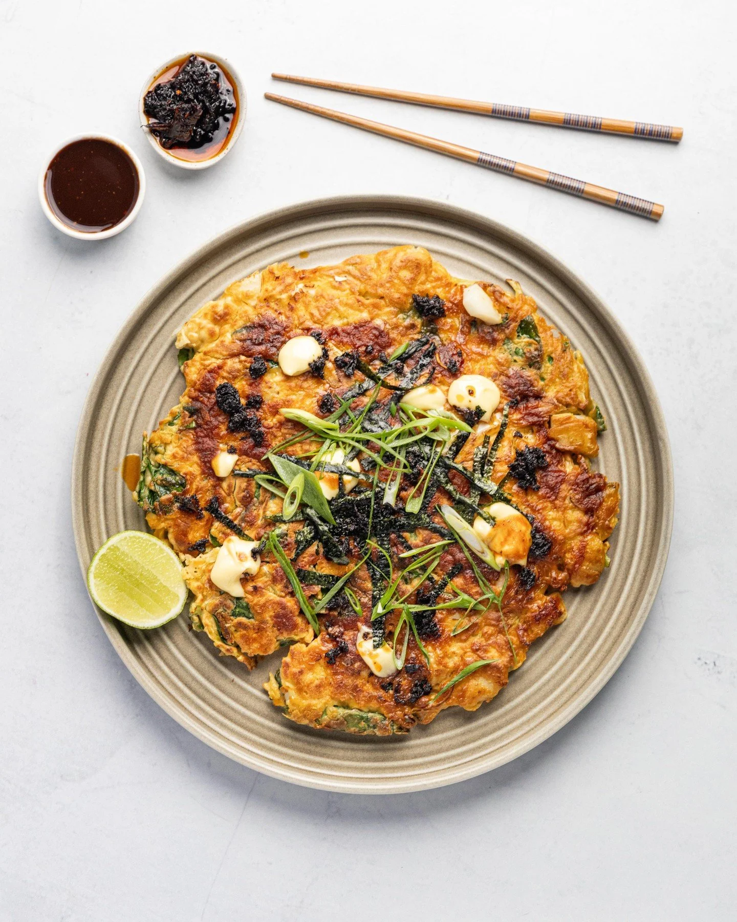 Japanese week has landed on GCBC 🇯🇵✨

Two showstopper recipes from today's episode:
🥞 Jo's Seafood Okonomiyaki with Crispy Chilli Oil
🍱 Mike's Chicken Karaage Sushi Rolls with Wasabi Mayo

Which one is going on your dinner menu this week? Drop 1 