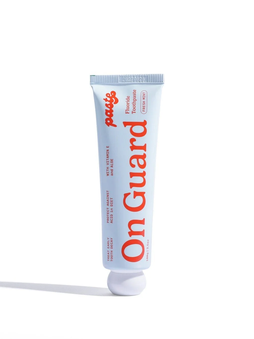 A tube of mint fluoride toothpaste.