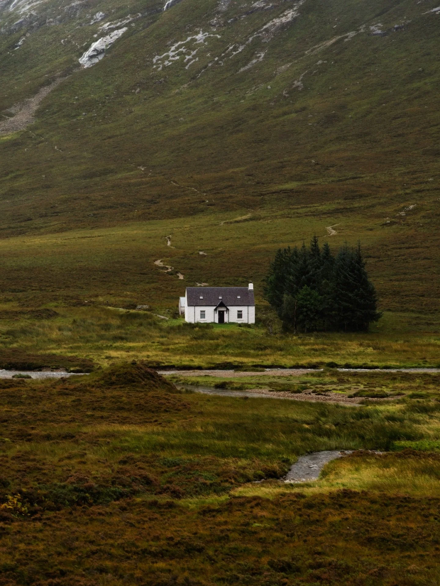 Glencoe, Scotland

&bull;My husband and I wanted to drive through the Glencoe Valley in Scotland because of its views as well as its several Harry Potter filming locations.

I also dreamed of photographing the Lagangarbh Hut, the single white cottage
