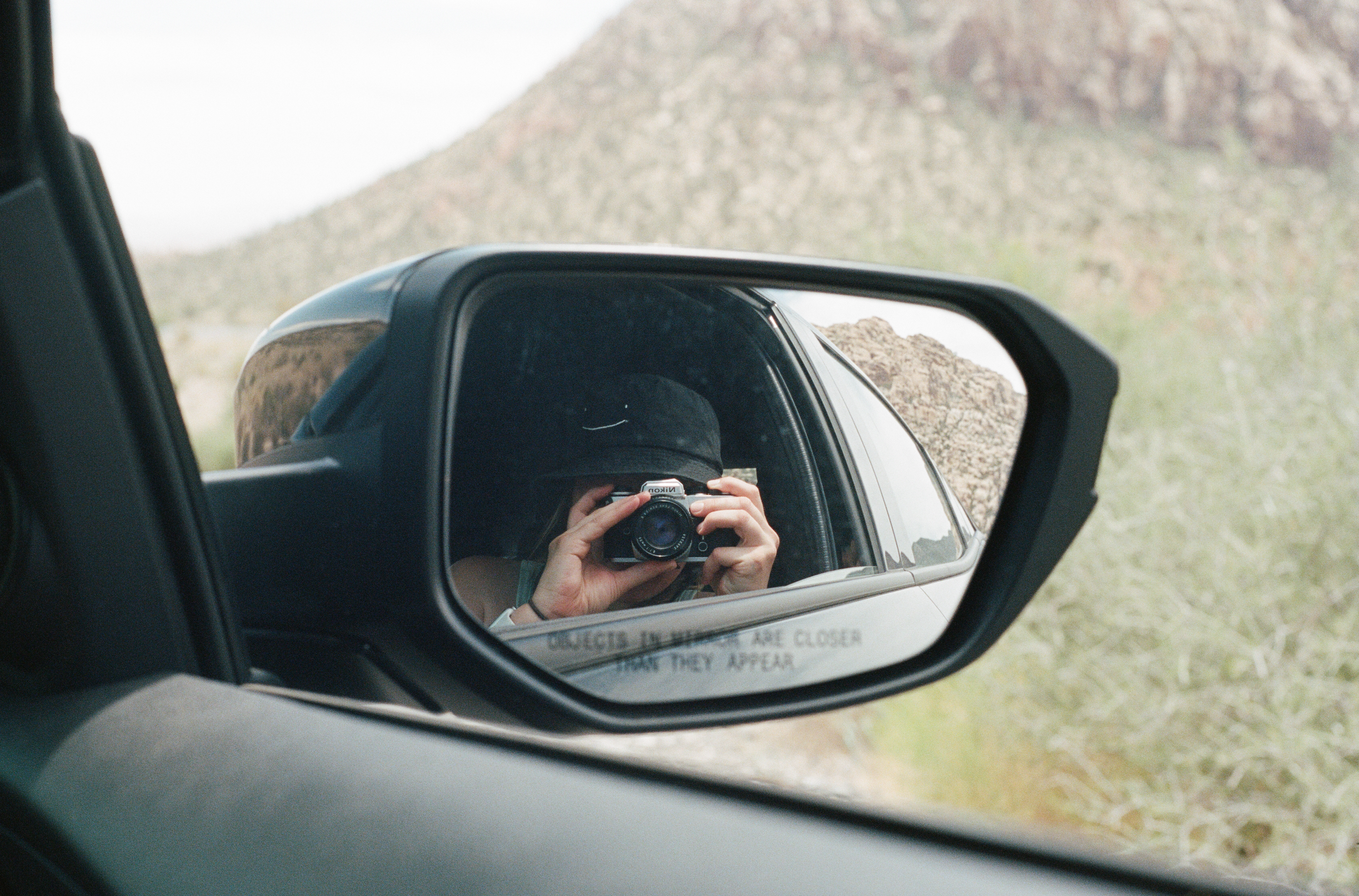 Red Rock Canyon National Conservation Area, Nevada on film, picture in car reflection