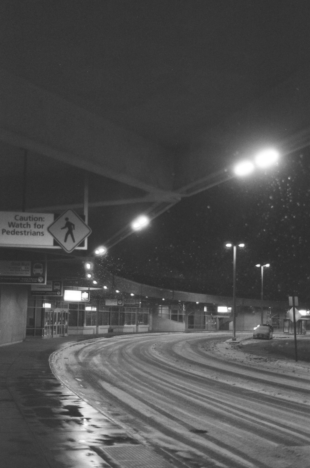 Black and white MCI Airport Kansas at nighttime on film