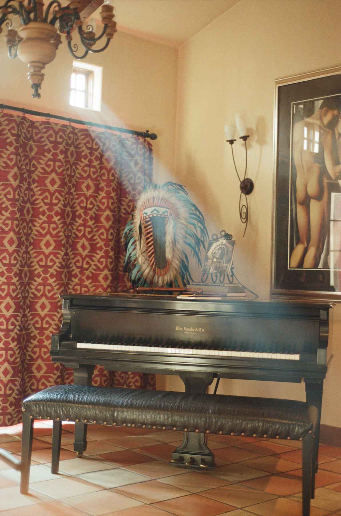 Beam of light and a baby grand piano on film