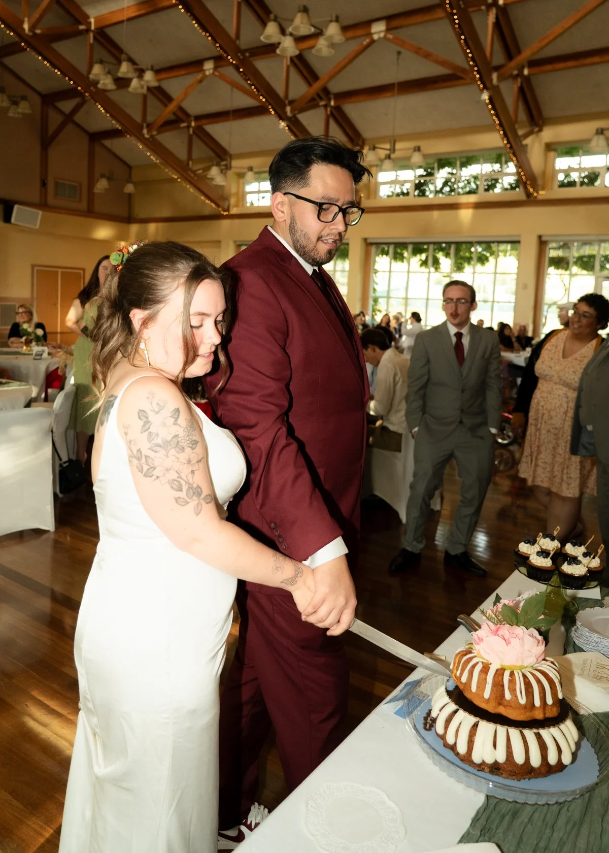 Goofy post wedding bride and groom photos  cake cutting