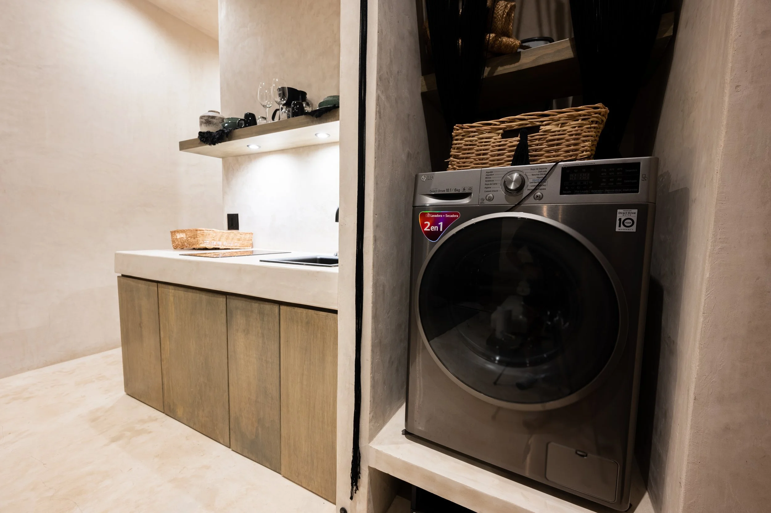 Laundry and kitchenette area at Esmeralda Tulum Suites