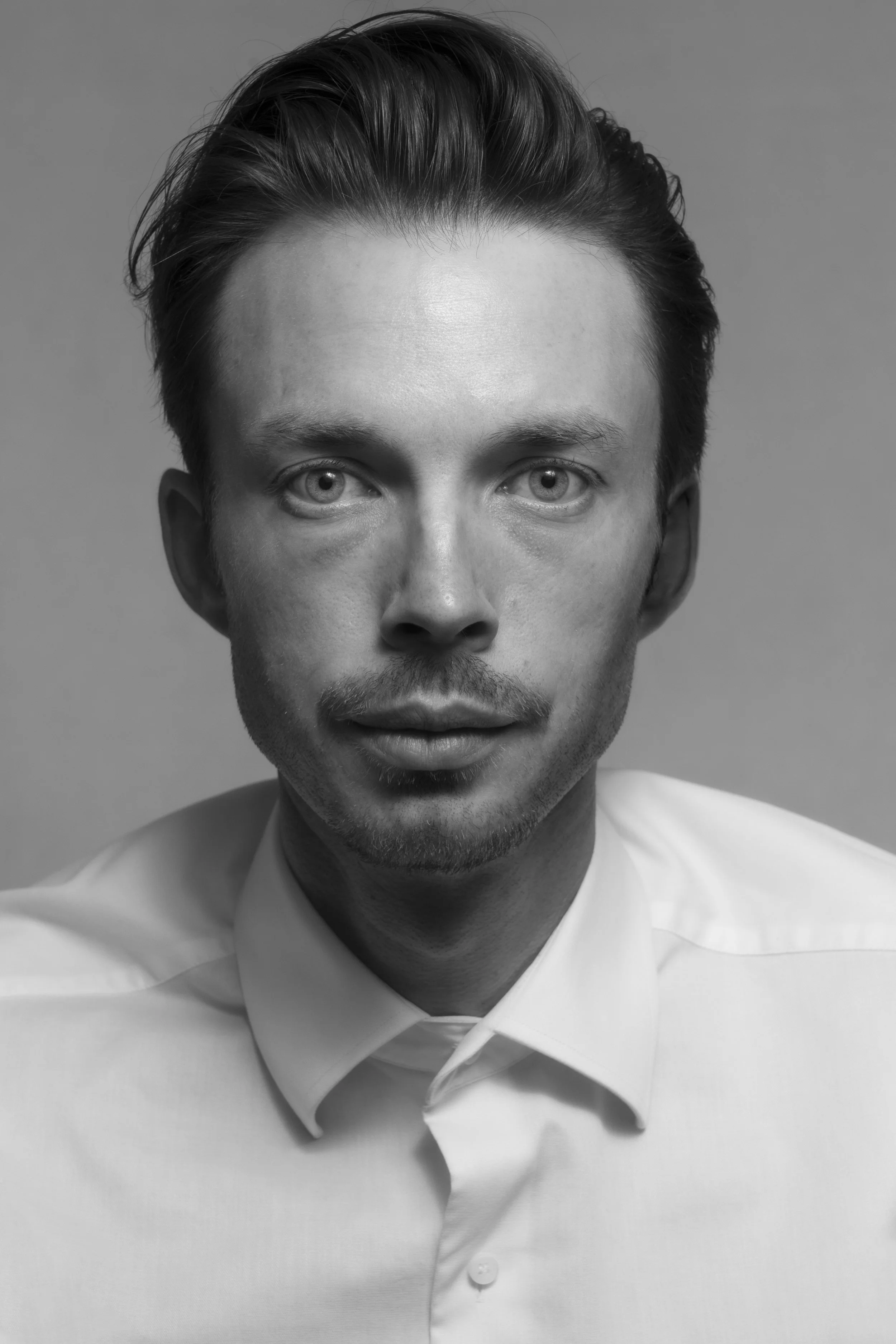 Ben Corlett Portrait Close Up Business BnW .jpg