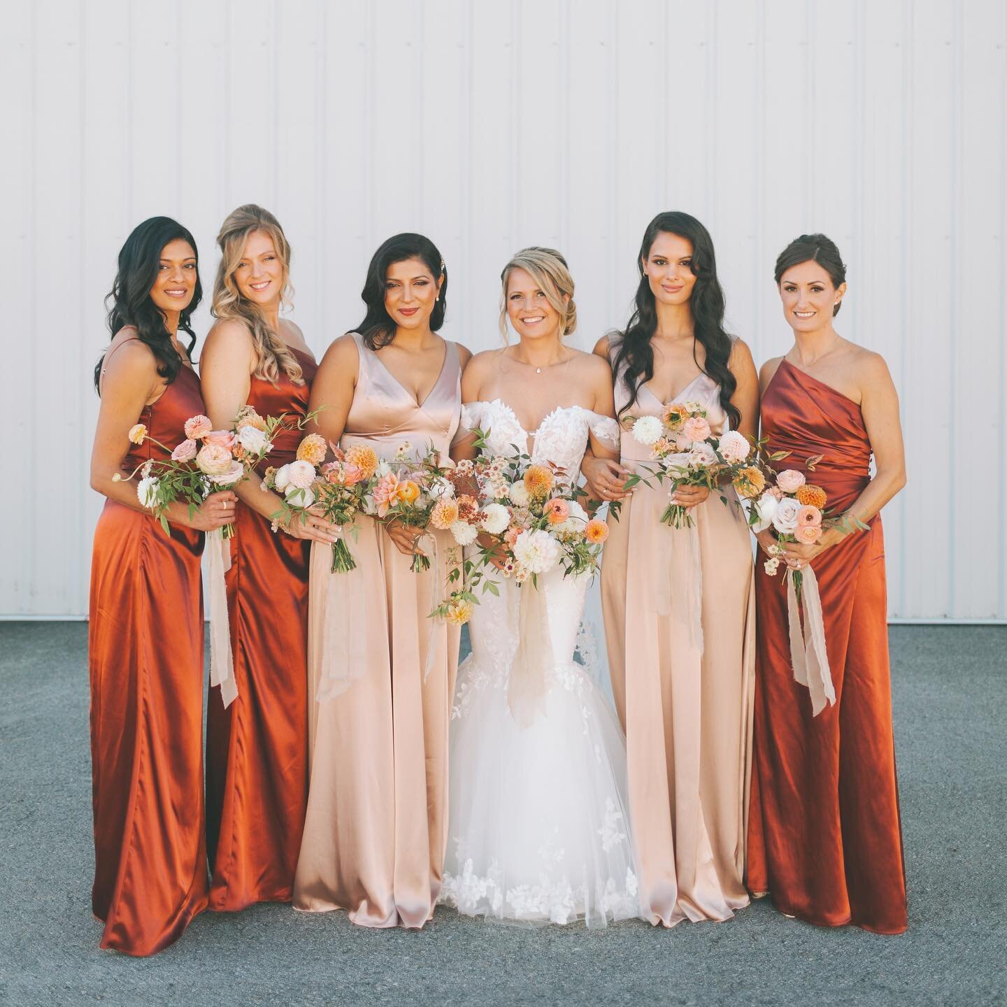 Cinnamon and champagne bridesmaid dresses paired with various shades of flowers ranging from peach to blush to burnt orange.  We love colour blending. 

#justynafloral #justynaflowers #flowers #floral #floraldesign #vancouverwedding #wedding #cinnamo