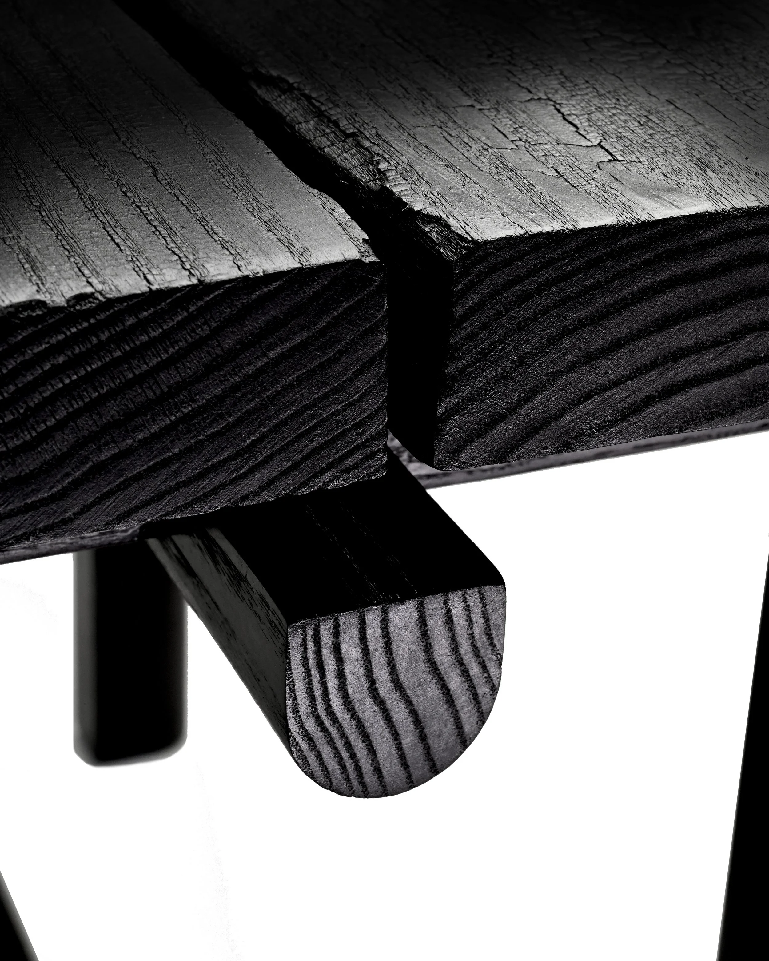 Charred wood and black stain bench