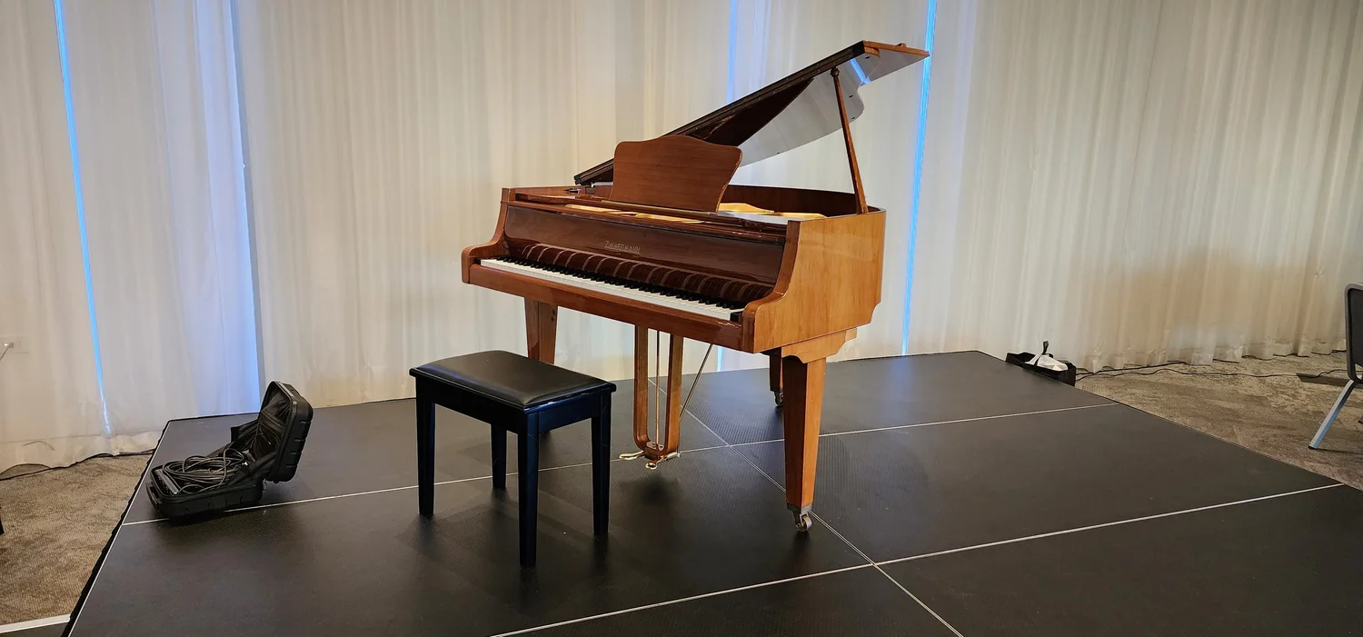 Grand piano on hire at an event