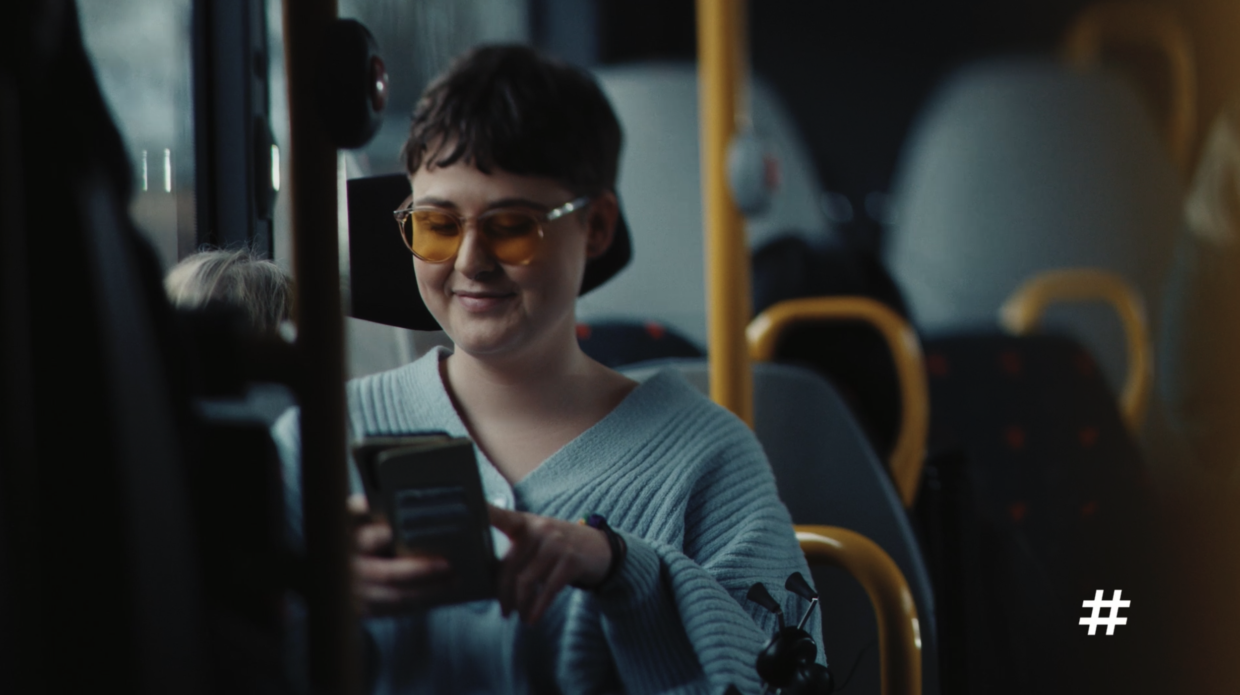 Passenger using a smartphone on a bus in a Ruter commercial, cinematography by Johan-Fredrik Bødtker.