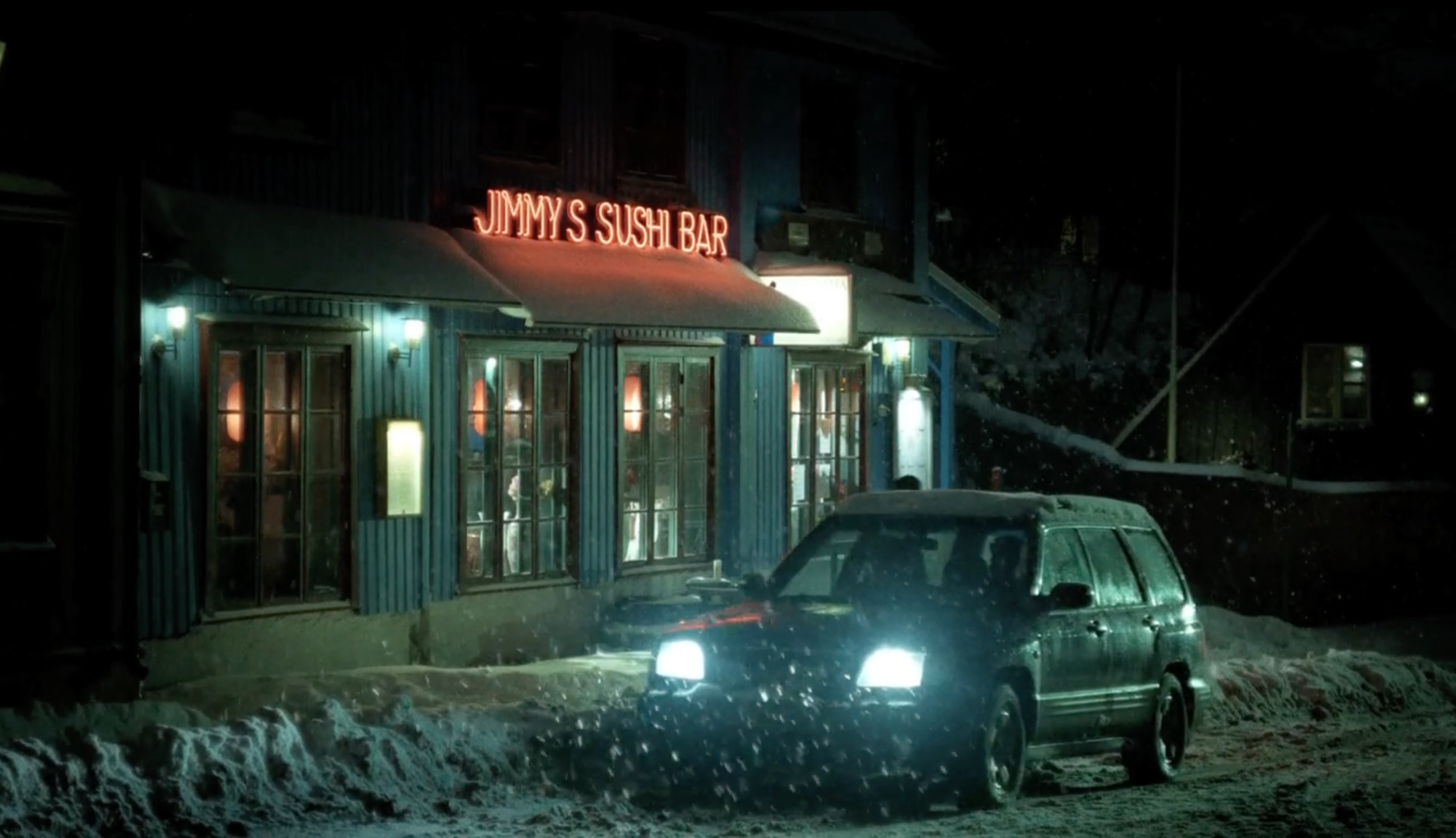 Car outside a restaurant on a snowy night in Lilyhammer, cinematography by Johan-Fredrik Bødtker.