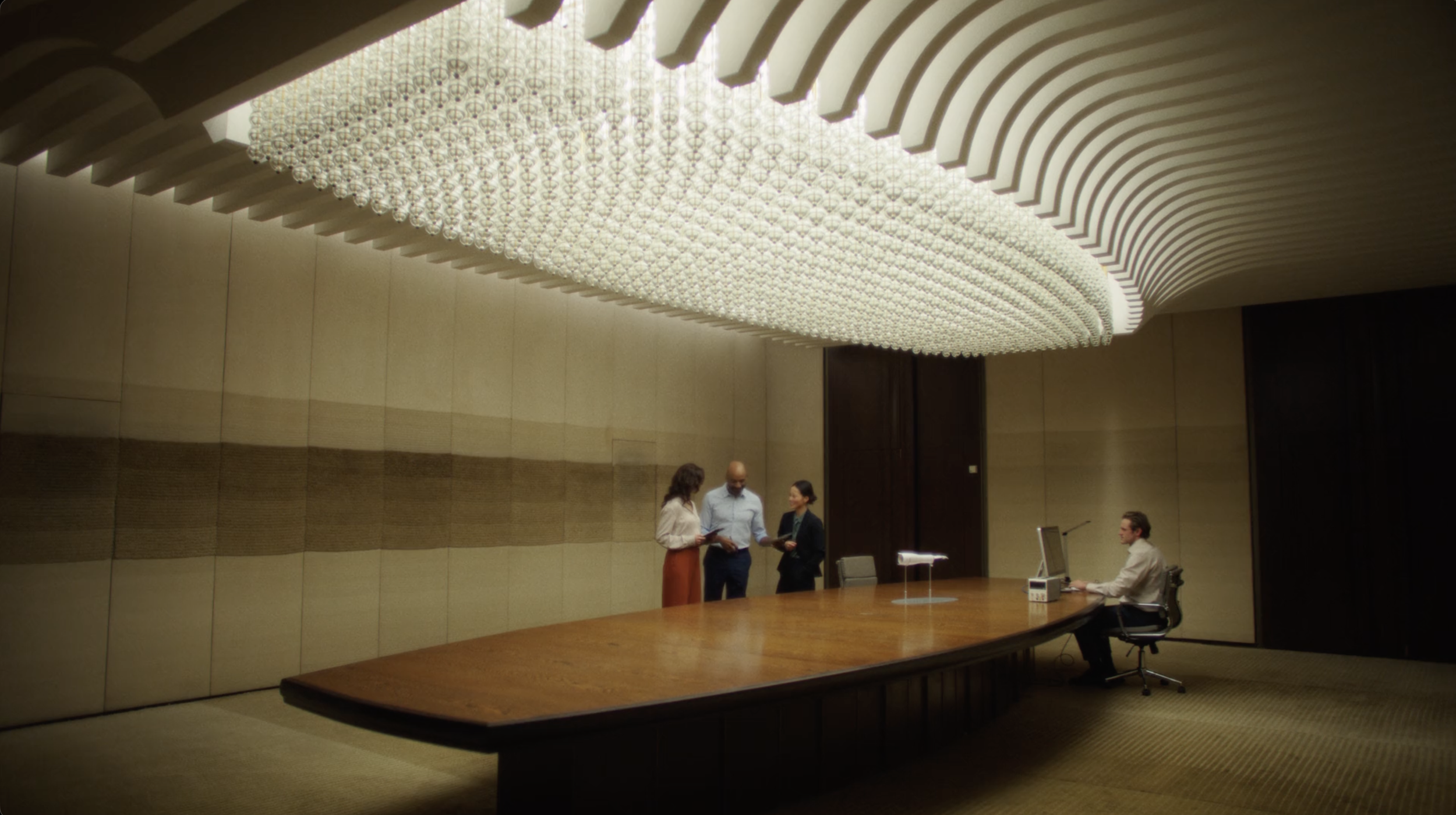 People gathered in a modern boardroom in a reMarkable commercial, cinematography by Johan-Fredrik Bødtker.