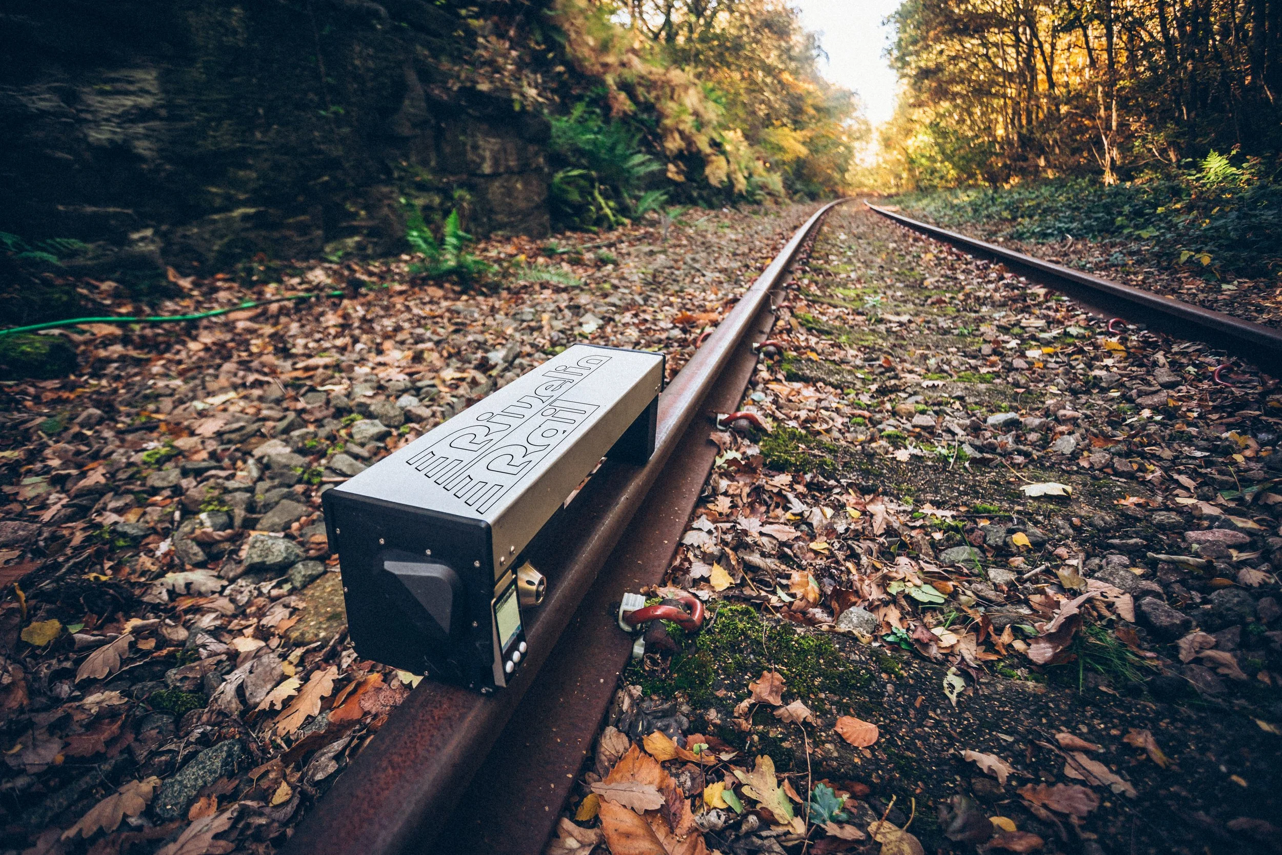A rivelin Rail portable rail tribometer on track near zermatt, switzerland, measuring friction