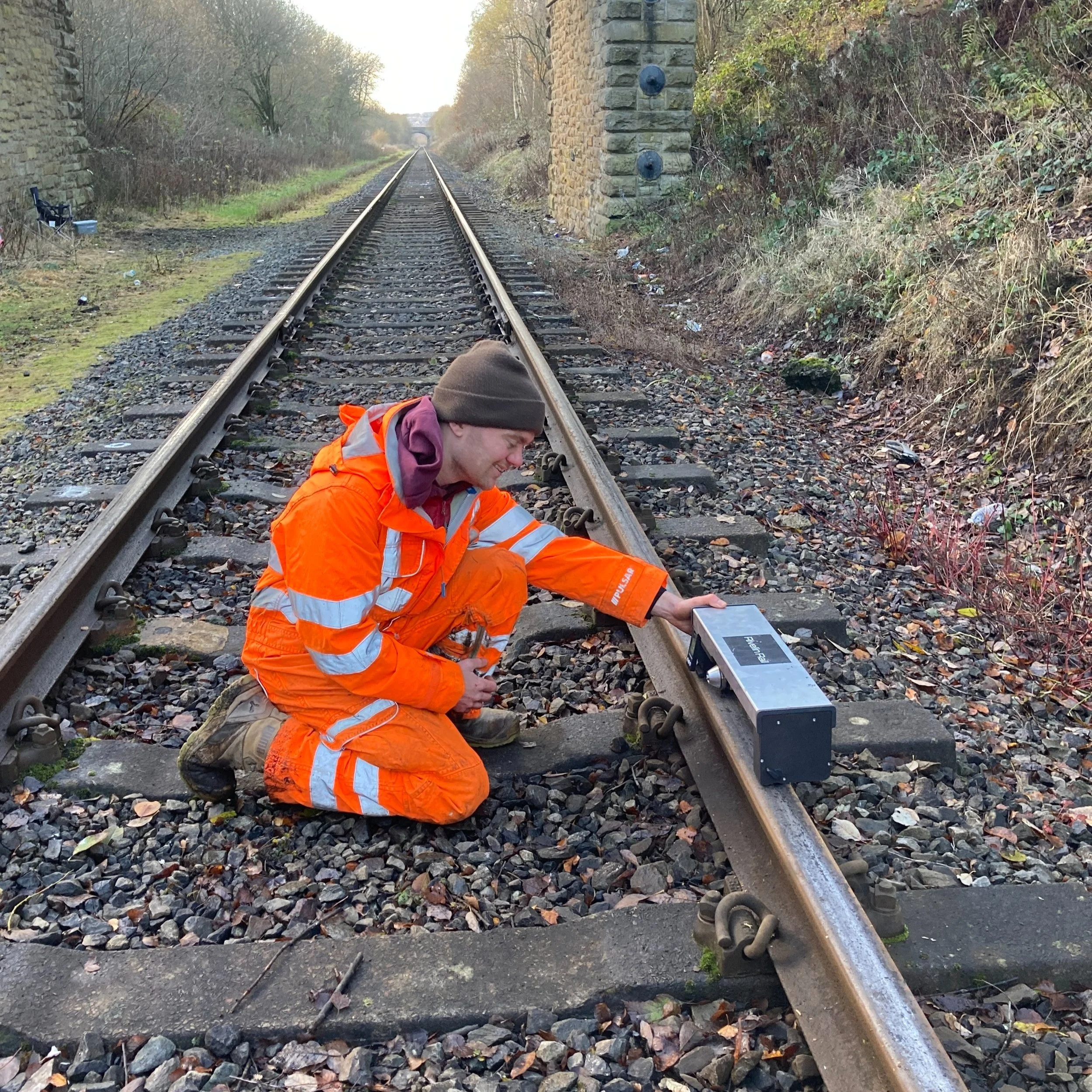Ben White Rivelin Rail co-founder carrying out a friction inspection using portable rail tribometer