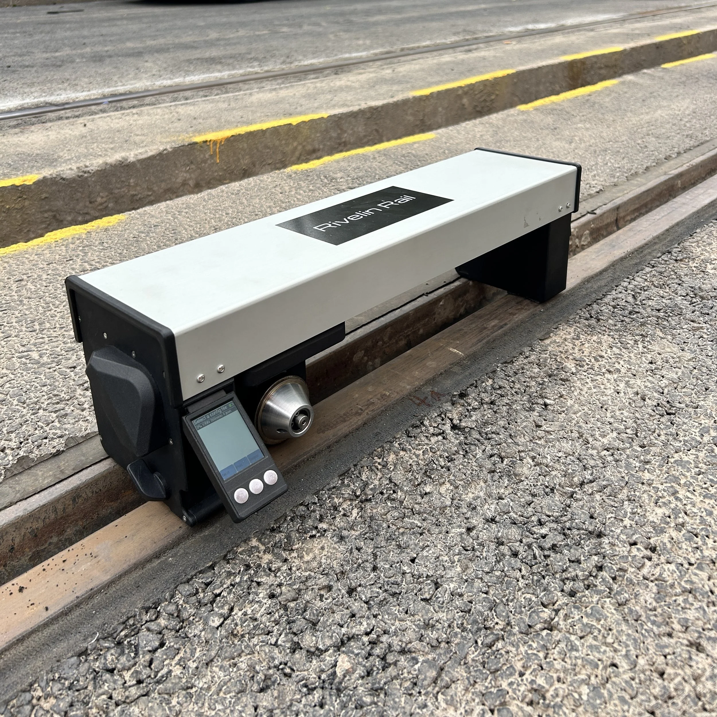 Friction management product approvals using rivelin rail portable rail tribometer, on embedded grooved tram track